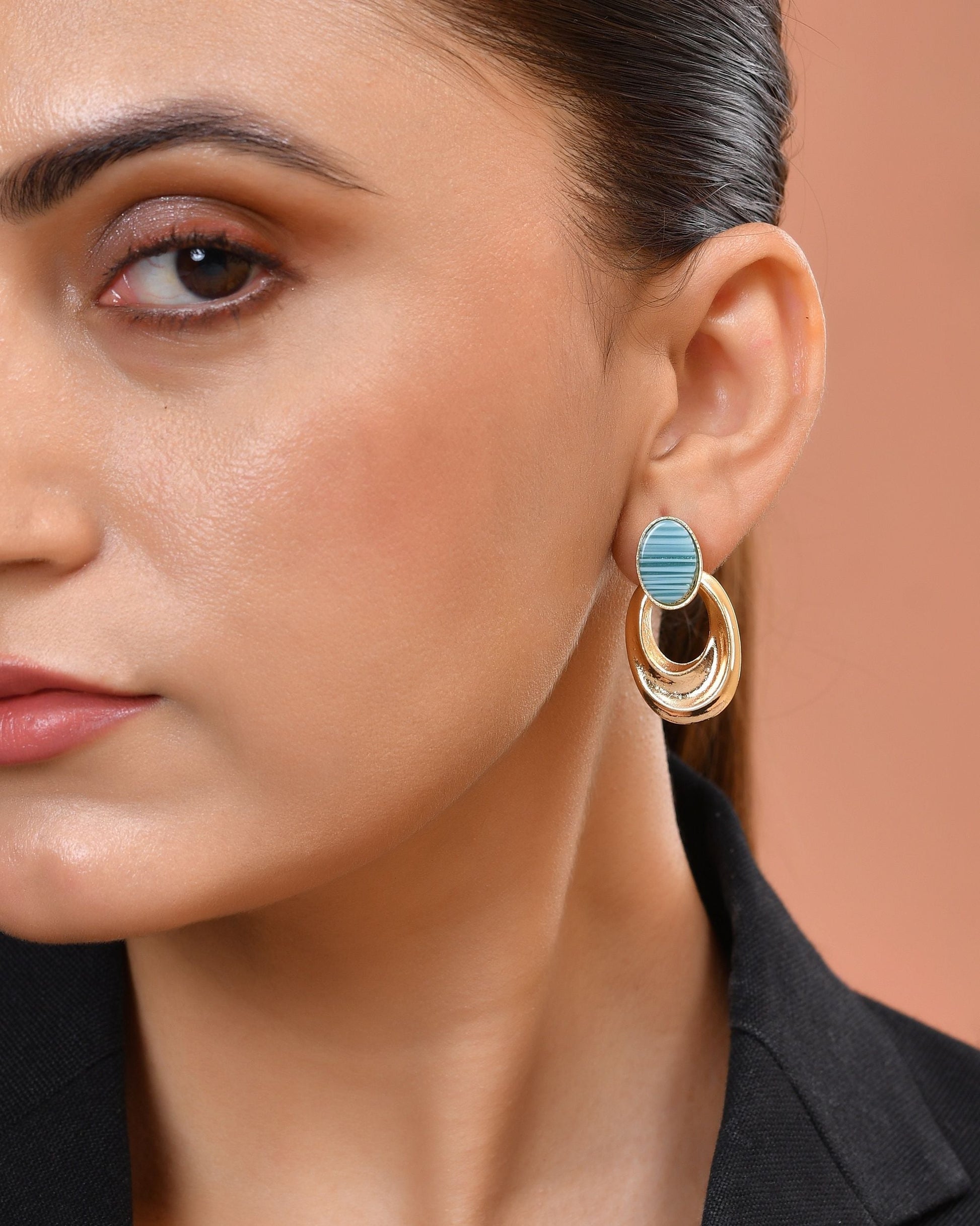 VOJ Gold Plated Blue Stone Studded Oval Shaped Earrings  Grab2Buy VOJ Grab2Buy