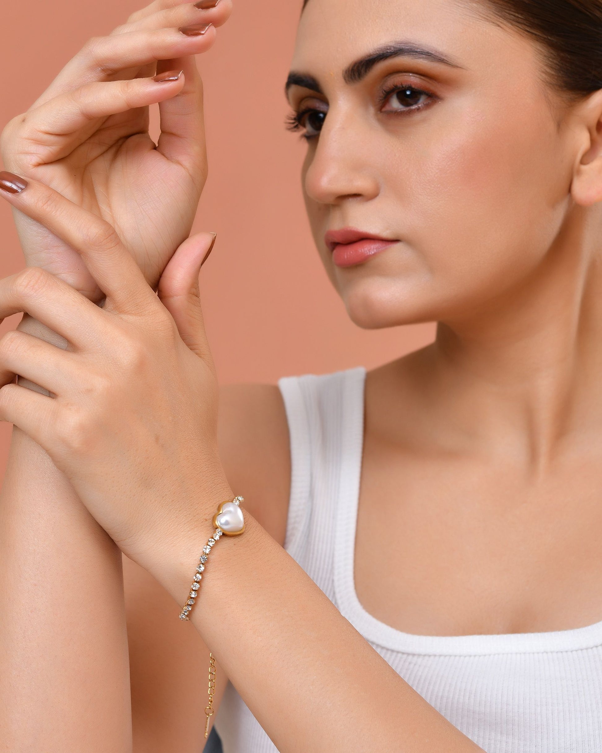 VOJ Gold Plated Ad Stone Studded With Heart Shaped Pearl Bracelet For Women  Grab2Buy VOJ Grab2Buy