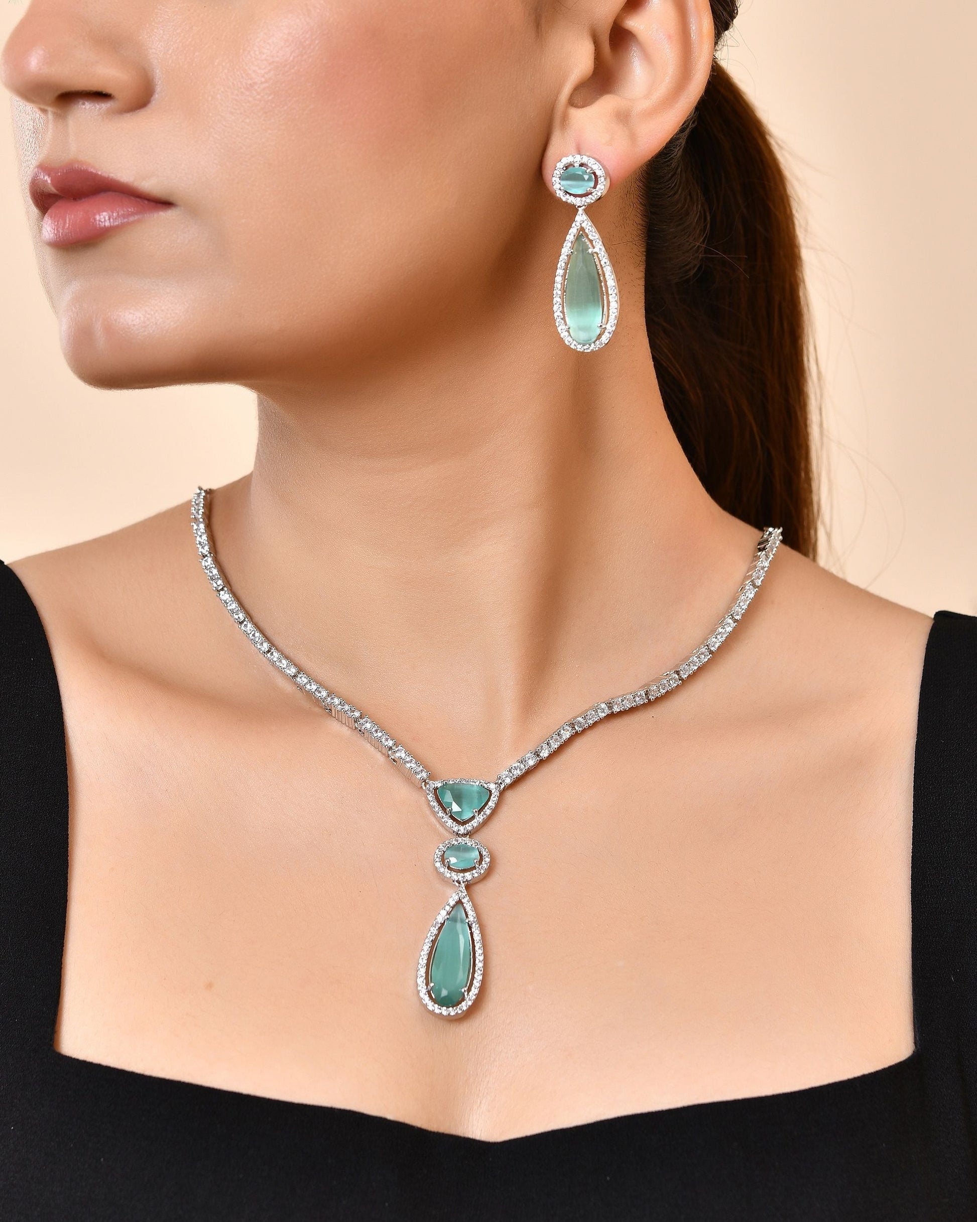 VOJ Silver-Plated Ad & Teal Green Cubic Zirconia Studded Jewellery Set  Grab2Buy VOJ Grab2Buy