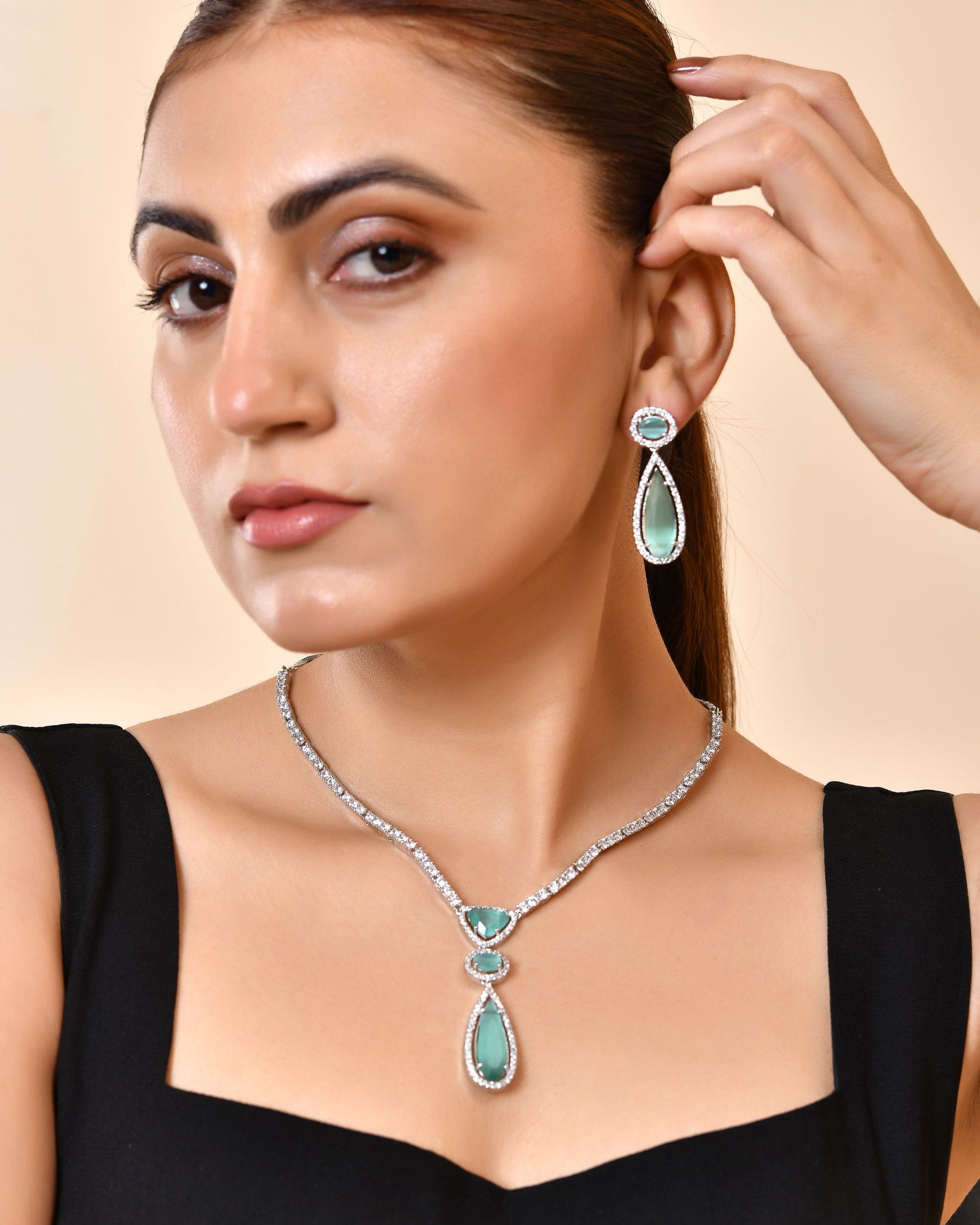VOJ Silver-Plated Ad & Teal Green Cubic Zirconia Studded Jewellery Set  Grab2Buy VOJ Grab2Buy