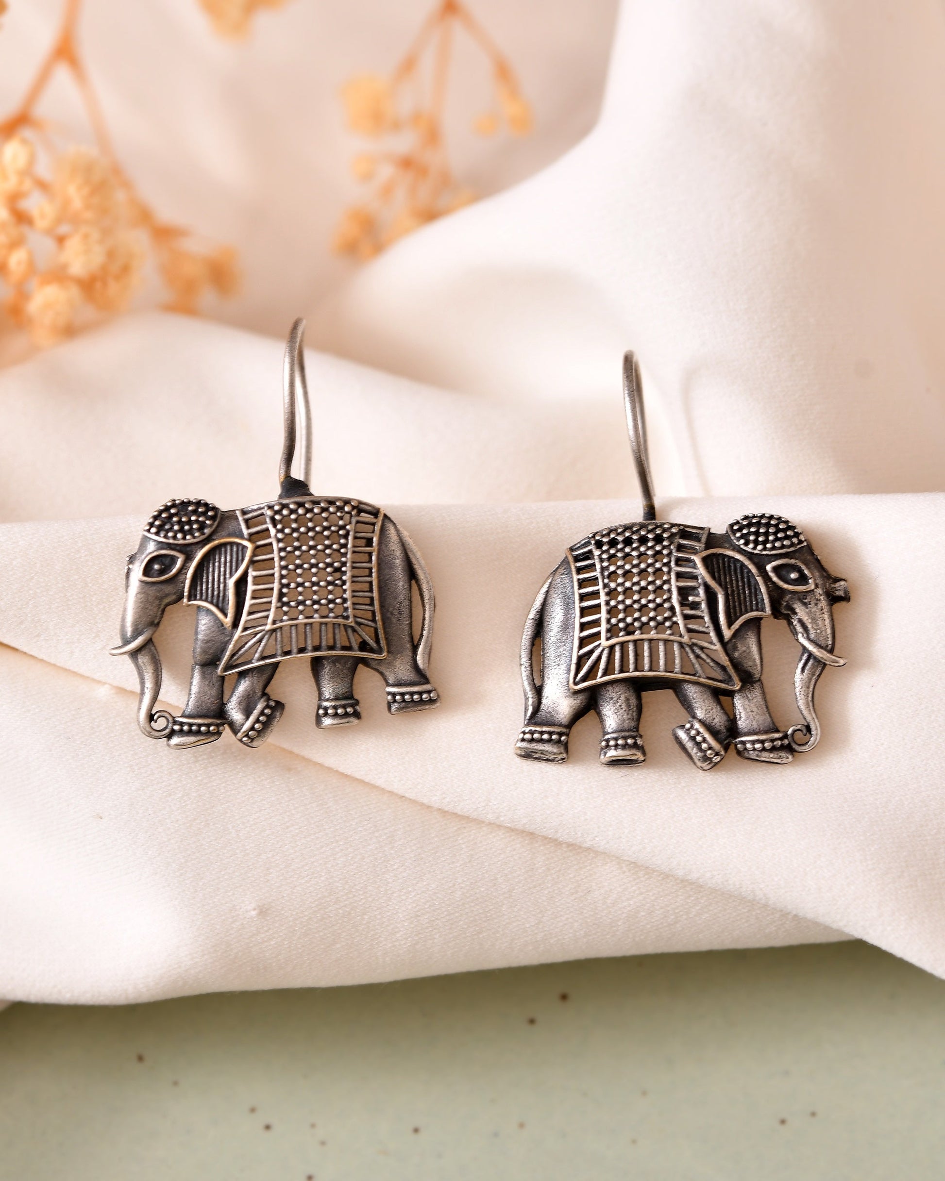VOJ Silver Toned Animal Designed Drop Earrings  Grab2Buy VOJ Grab2Buy