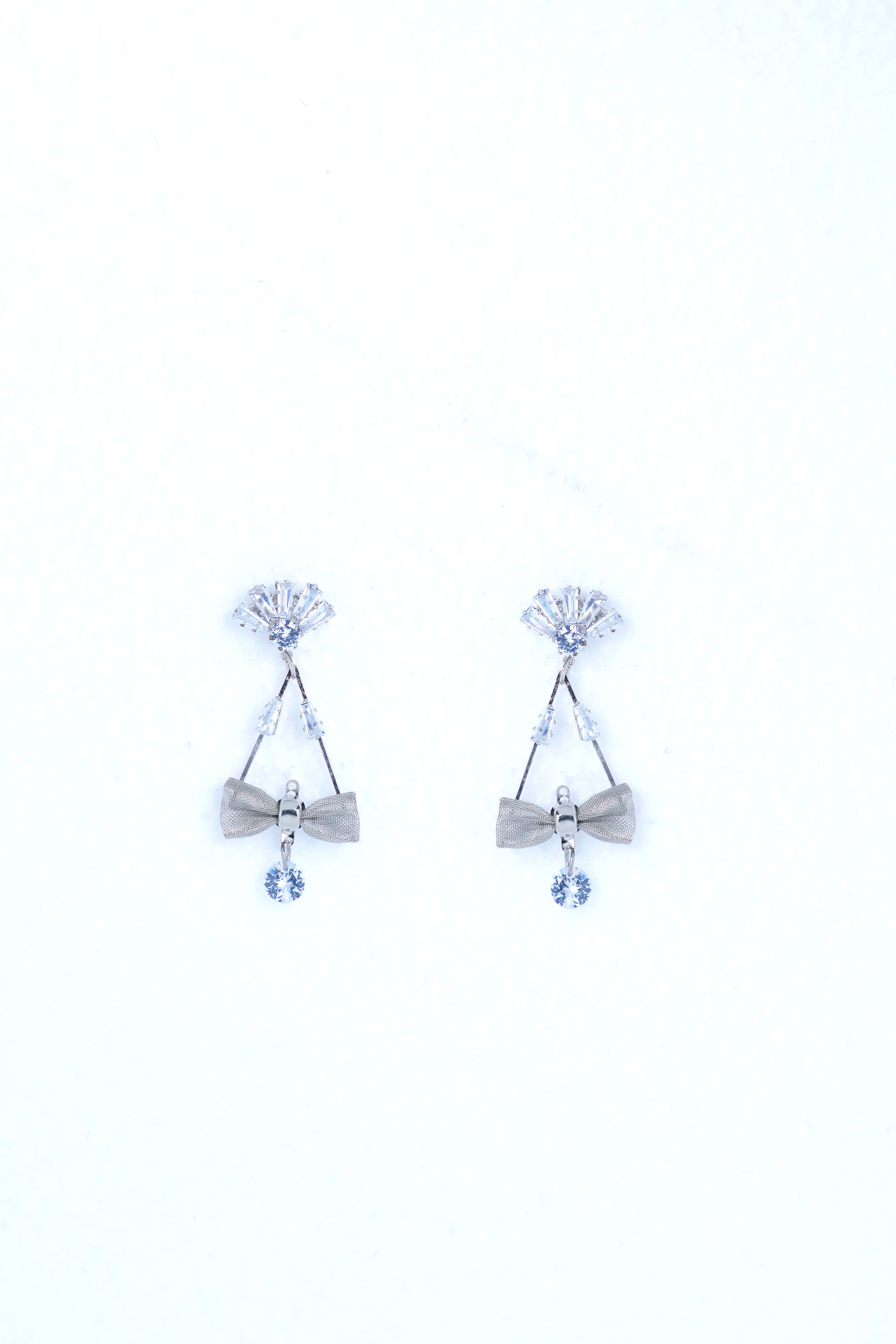 VOJ Silver Plated Stone Studded With Bow Triangle Shaped Earrings - Grab2buy
