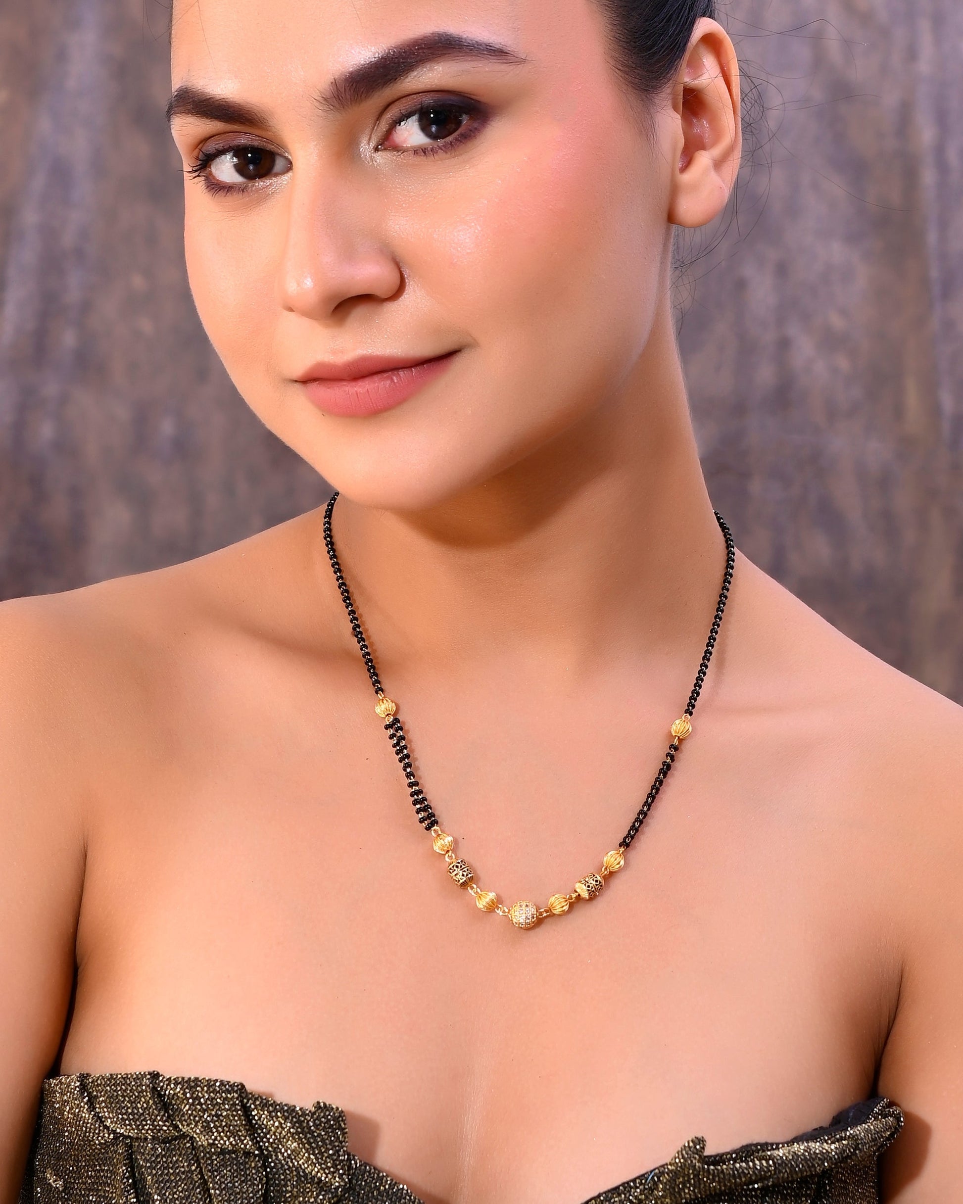 VOJ Gold-Polished Stone Studded Cricular shaped Mangalsutra 