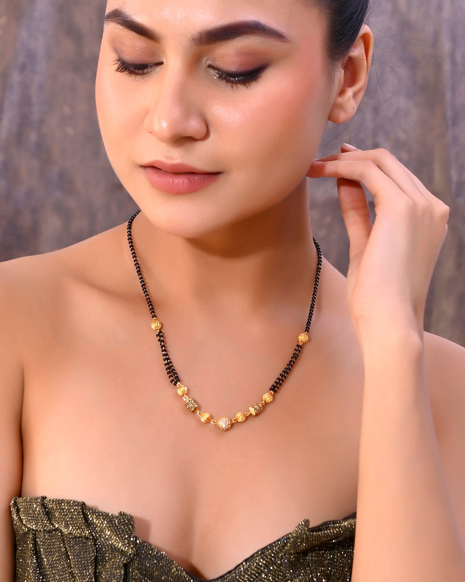 VOJ Gold-Polished Stone Studded Cricular shaped Mangalsutra 