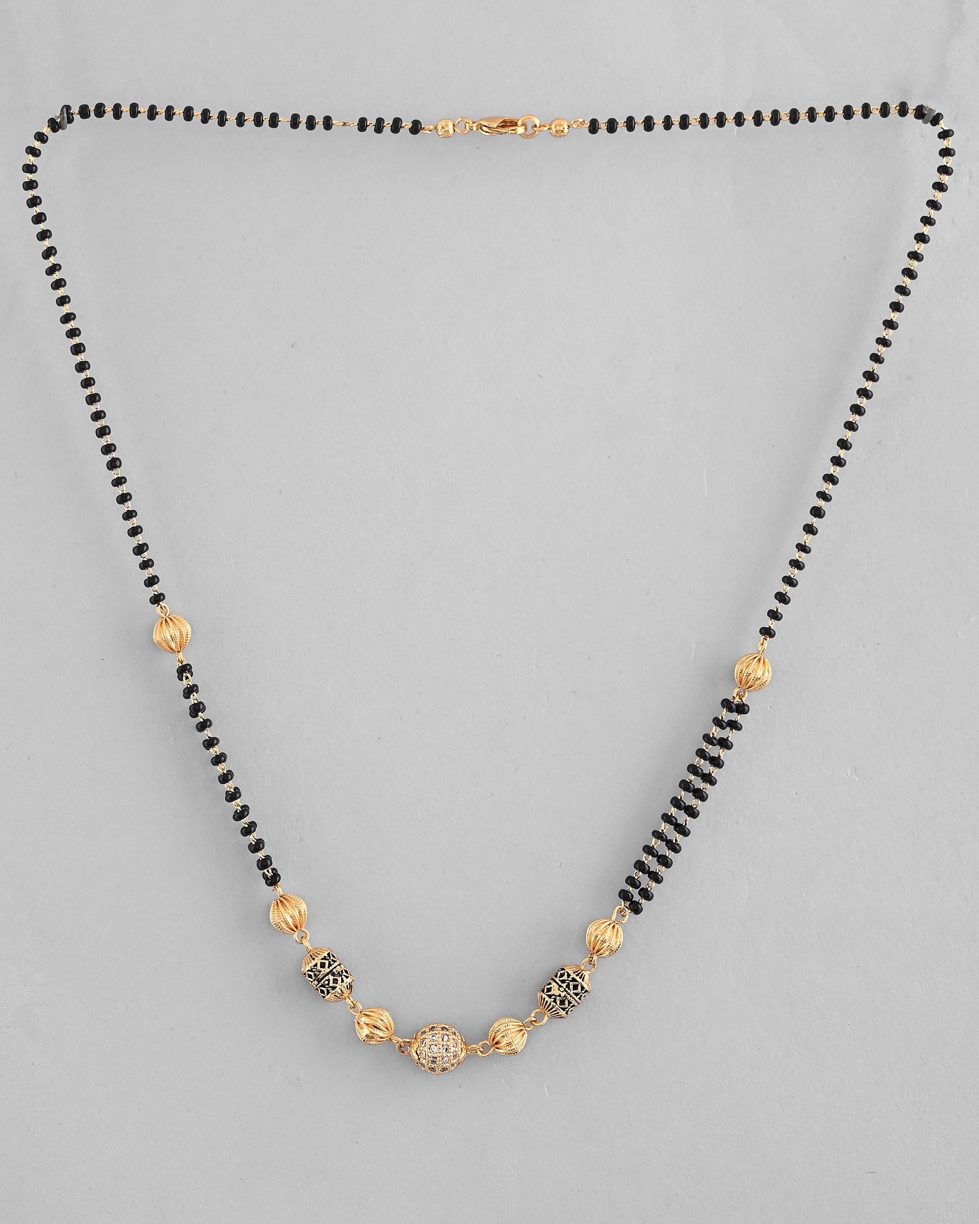 VOJ Gold-Polished Stone Studded Cricular shaped Mangalsutra 