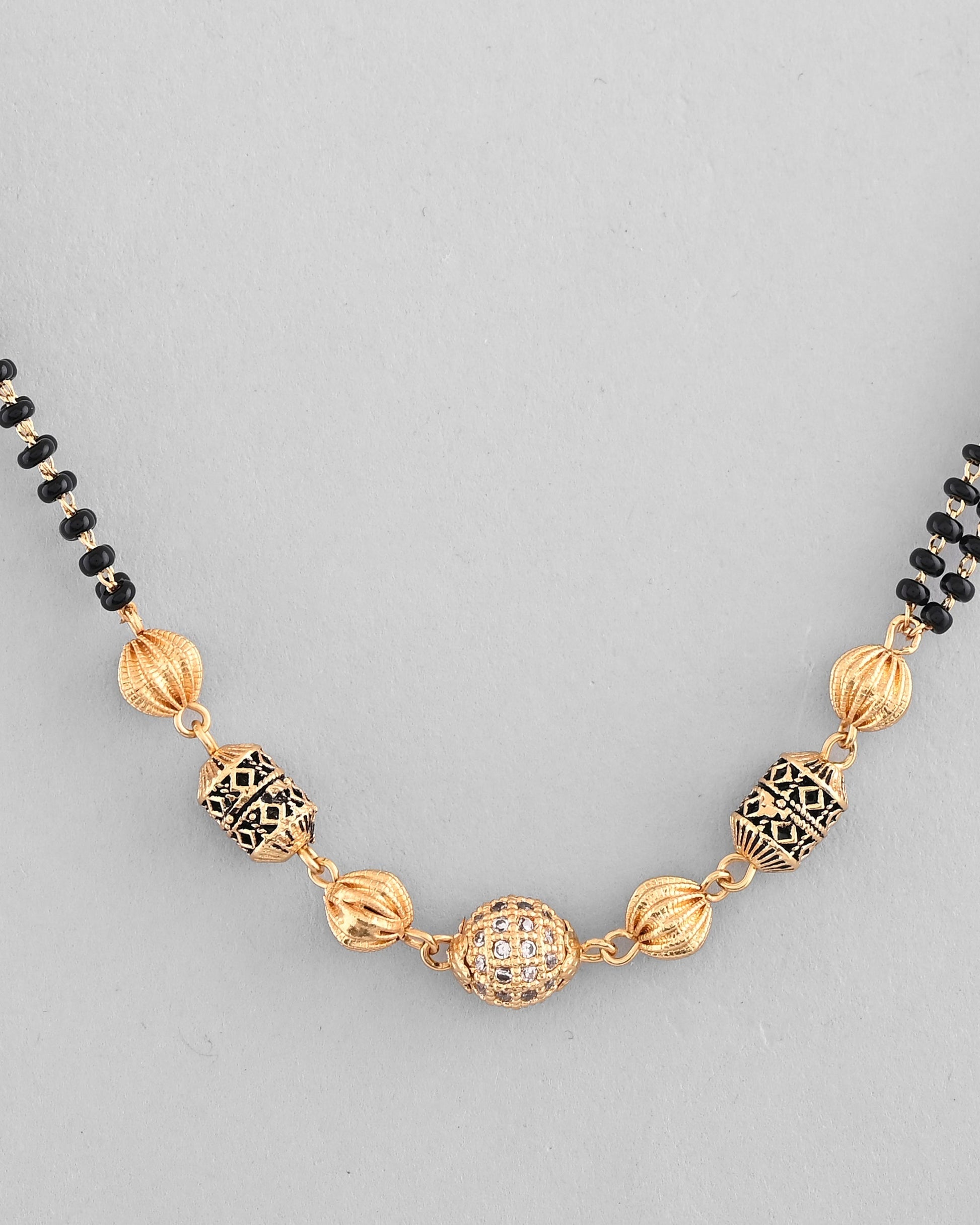 VOJ Gold-Polished Stone Studded Cricular shaped Mangalsutra 