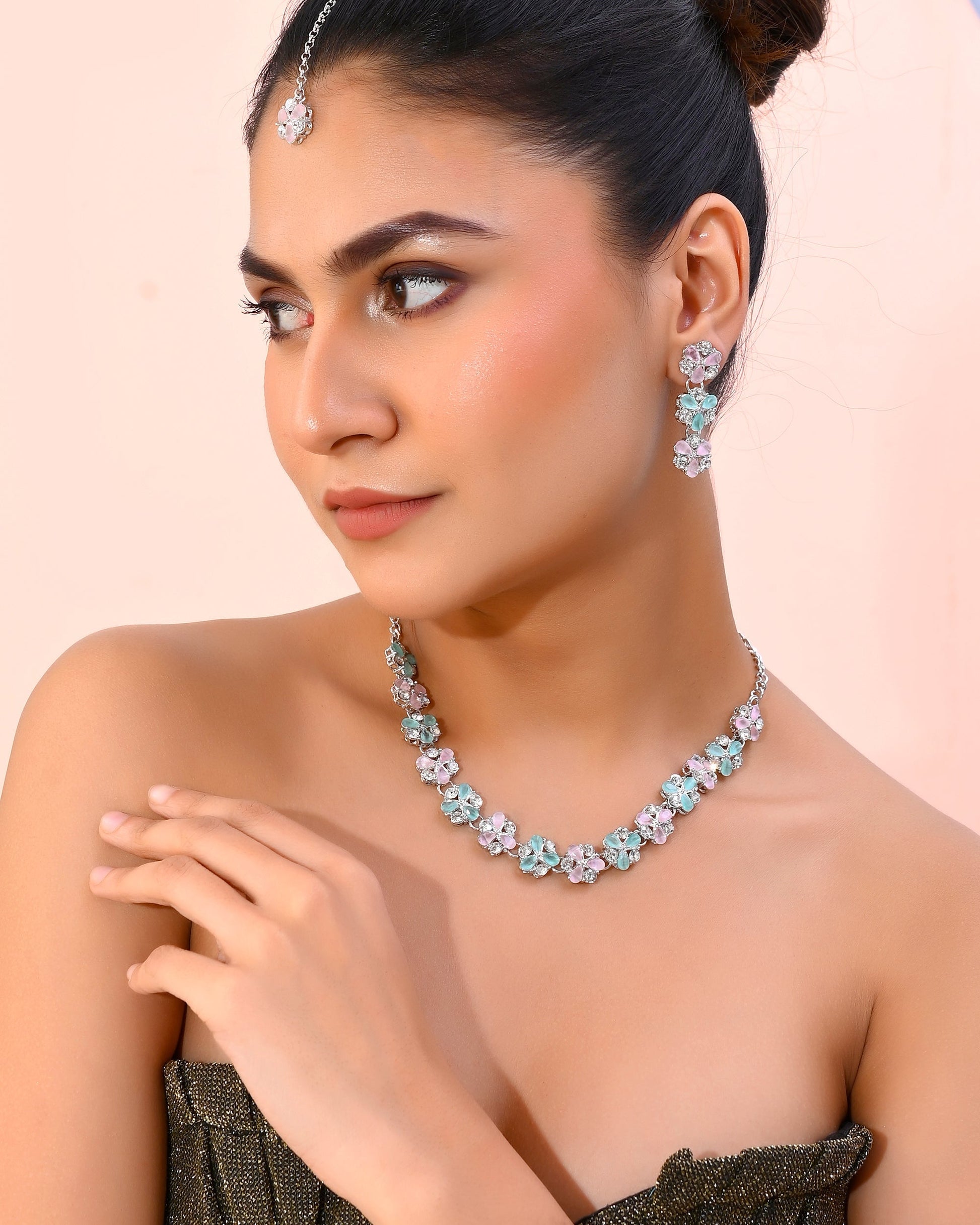 VOJ Silver Plated AD With Nude Green And Light Pink Flower Jewellery Set With Mangtikka VOJ (Valley Of Jewellery)