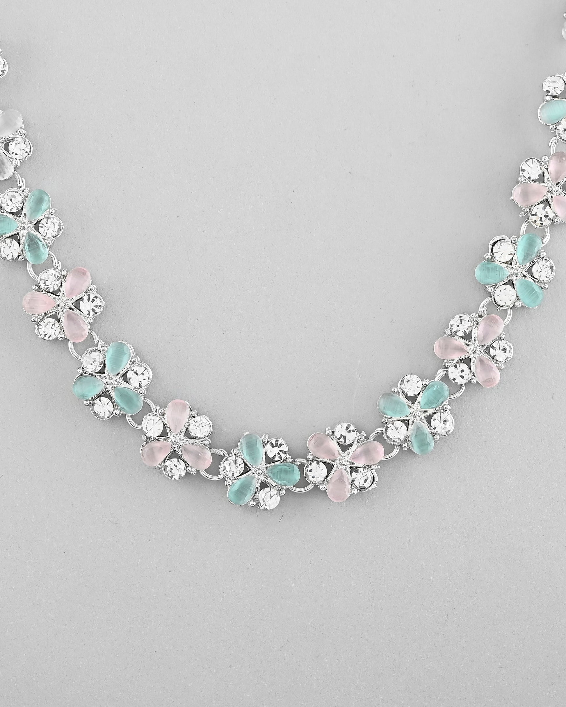 VOJ Silver Plated AD With Nude Green And Light Pink Flower Jewellery Set With Mangtikka VOJ (Valley Of Jewellery)