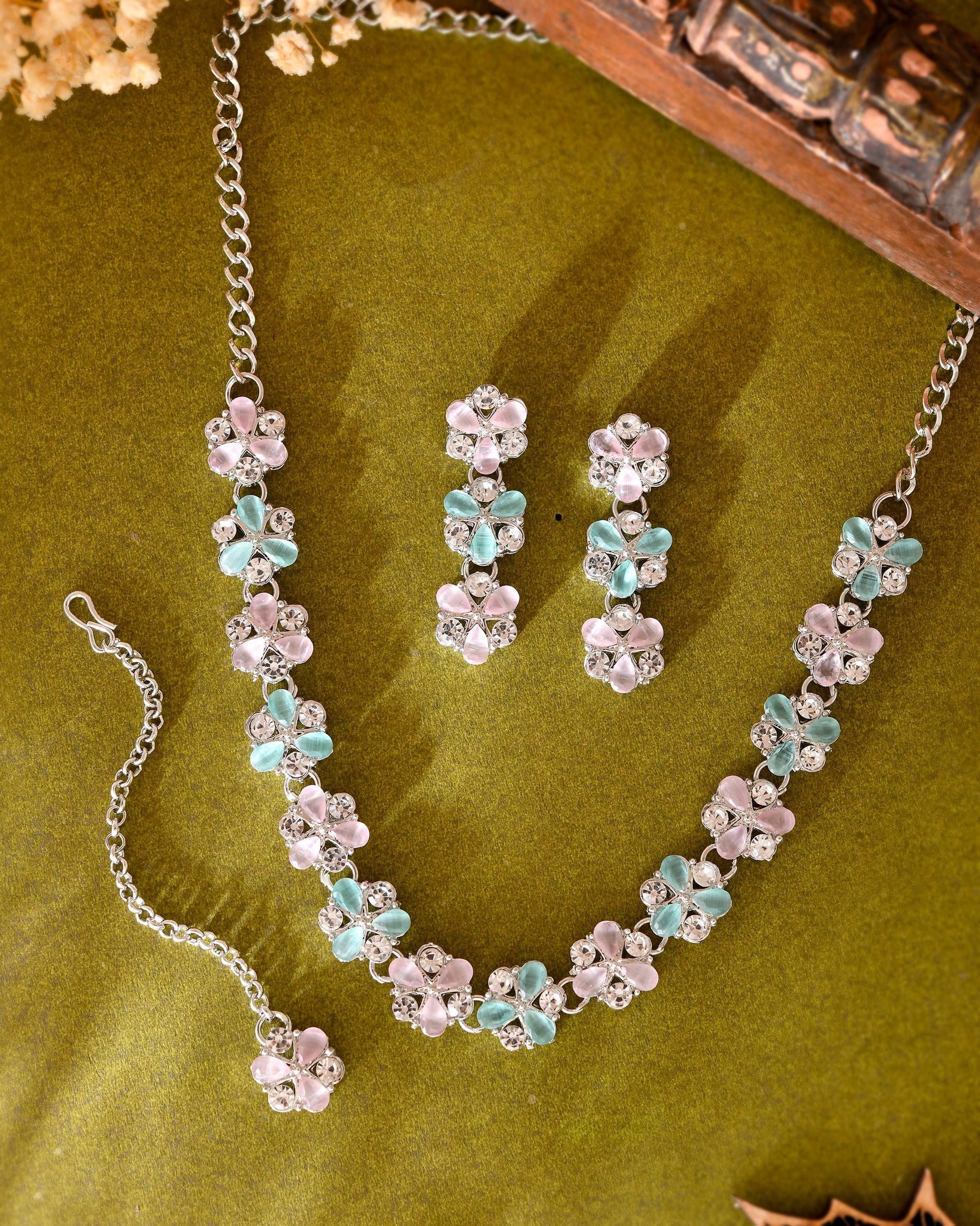 VOJ Silver Plated AD With Nude Green And Light Pink Flower Jewellery Set With Mangtikka VOJ (Valley Of Jewellery)