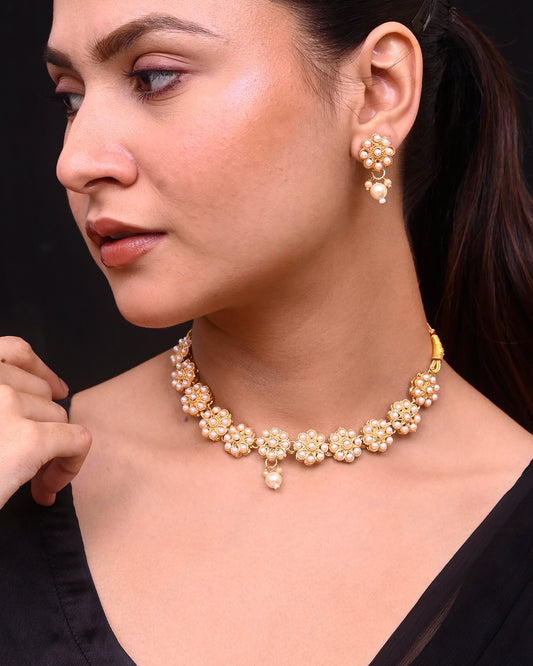 VOJ Gold-Polished Pearl Studded Floral Necklace And Earrings VOJ (Valley Of Jewellery)
