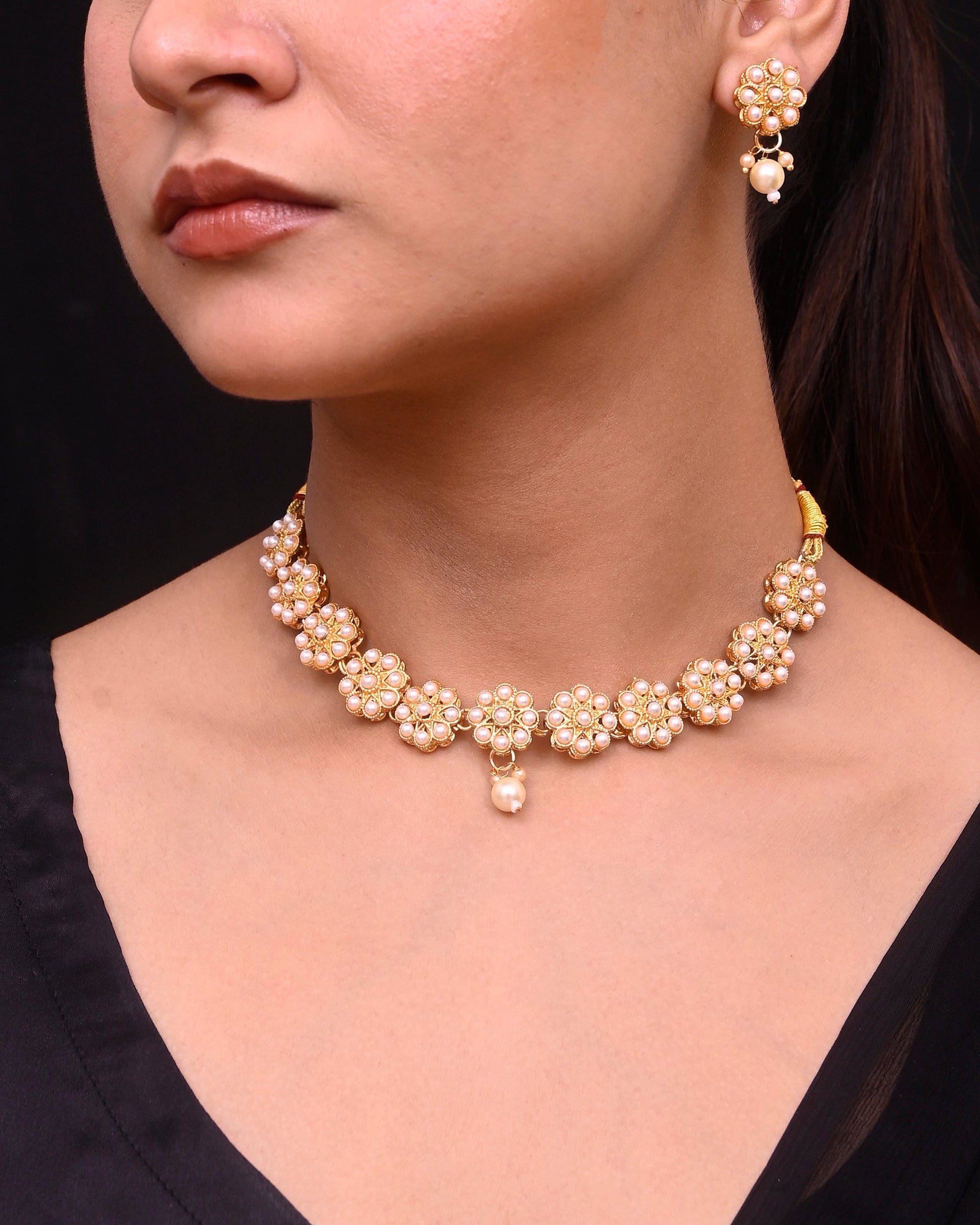VOJ Gold-Polished Pearl Studded Floral Necklace And Earrings VOJ (Valley Of Jewellery)