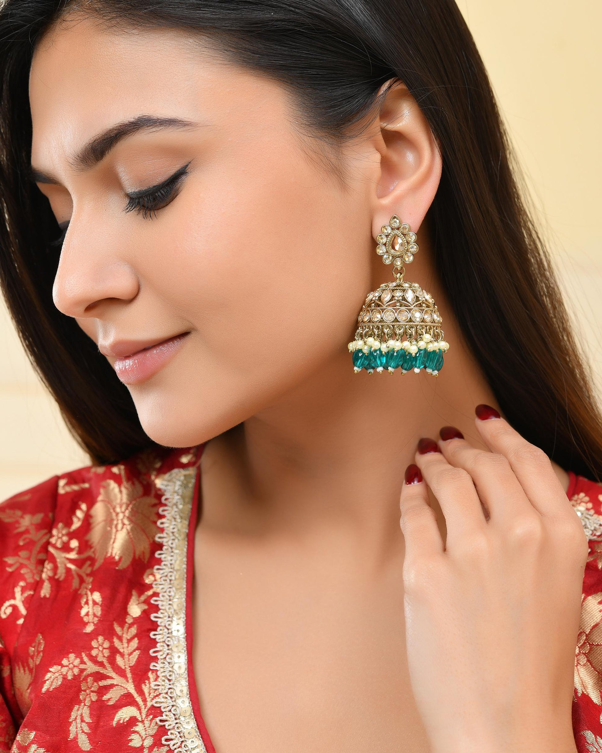 VOJ Gold-Polished Stone Studded Dome Shaped Jhumkas VOJ (Valley Of Jewellery)