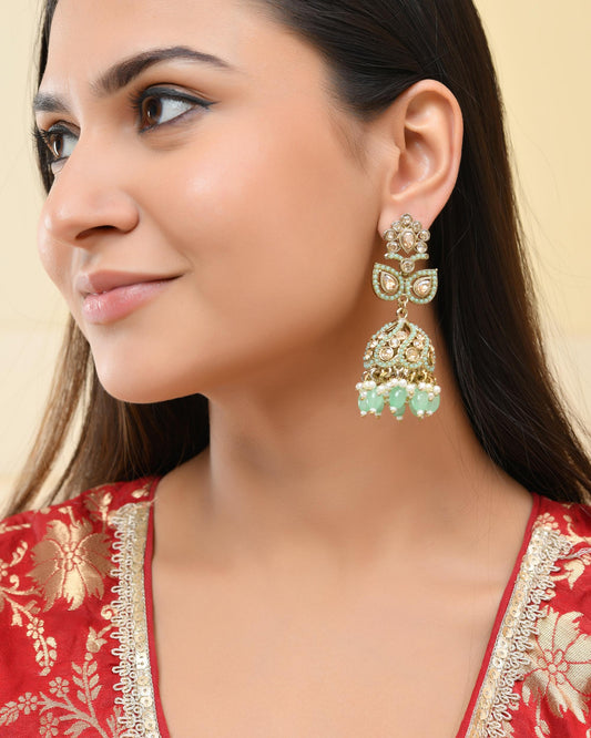 VOJ Mint Green Stone Studded Gold-Polished Jhumkas VOJ (Valley Of Jewellery)
