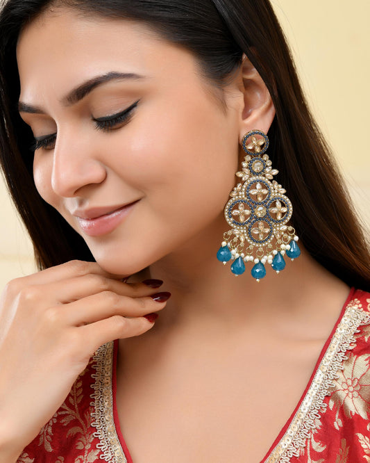 VOJ Blue Stone Studded Gold-Polished Crescent Shaped Earrings VOJ (Valley Of Jewellery)