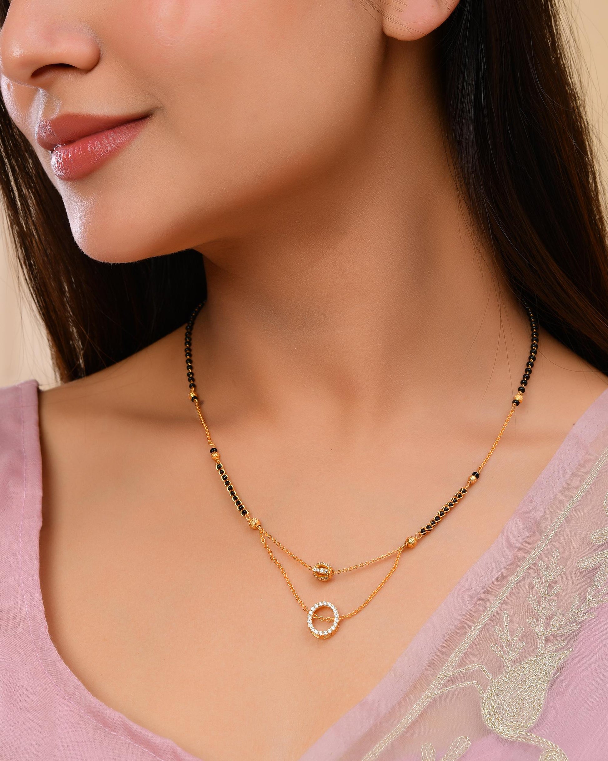 VOJ Gold-Polished Ad Studded Oval Shaped Mangalsutra 