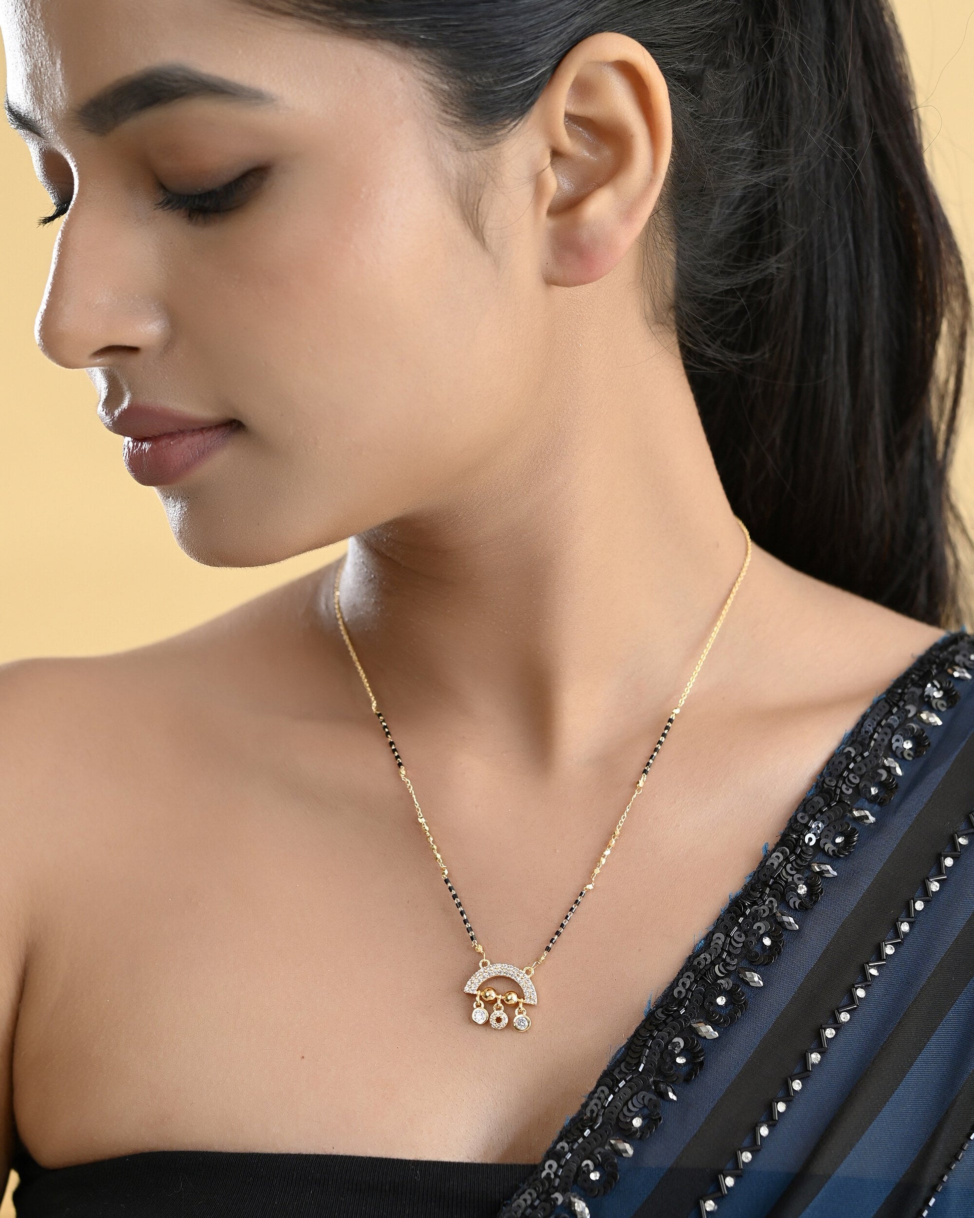 VOJ Gold-Polished AD Studded Half Done Shape Mangalsutra 