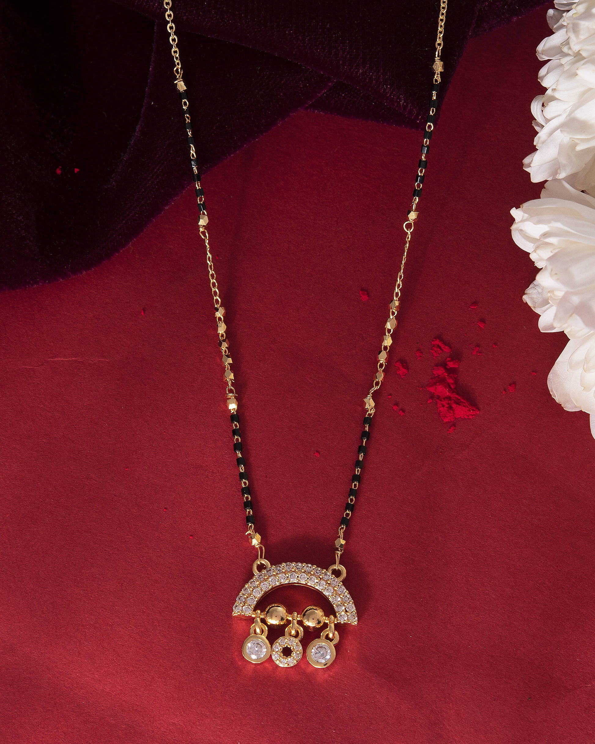 VOJ Gold-Polished AD Studded Half Done Shape Mangalsutra 