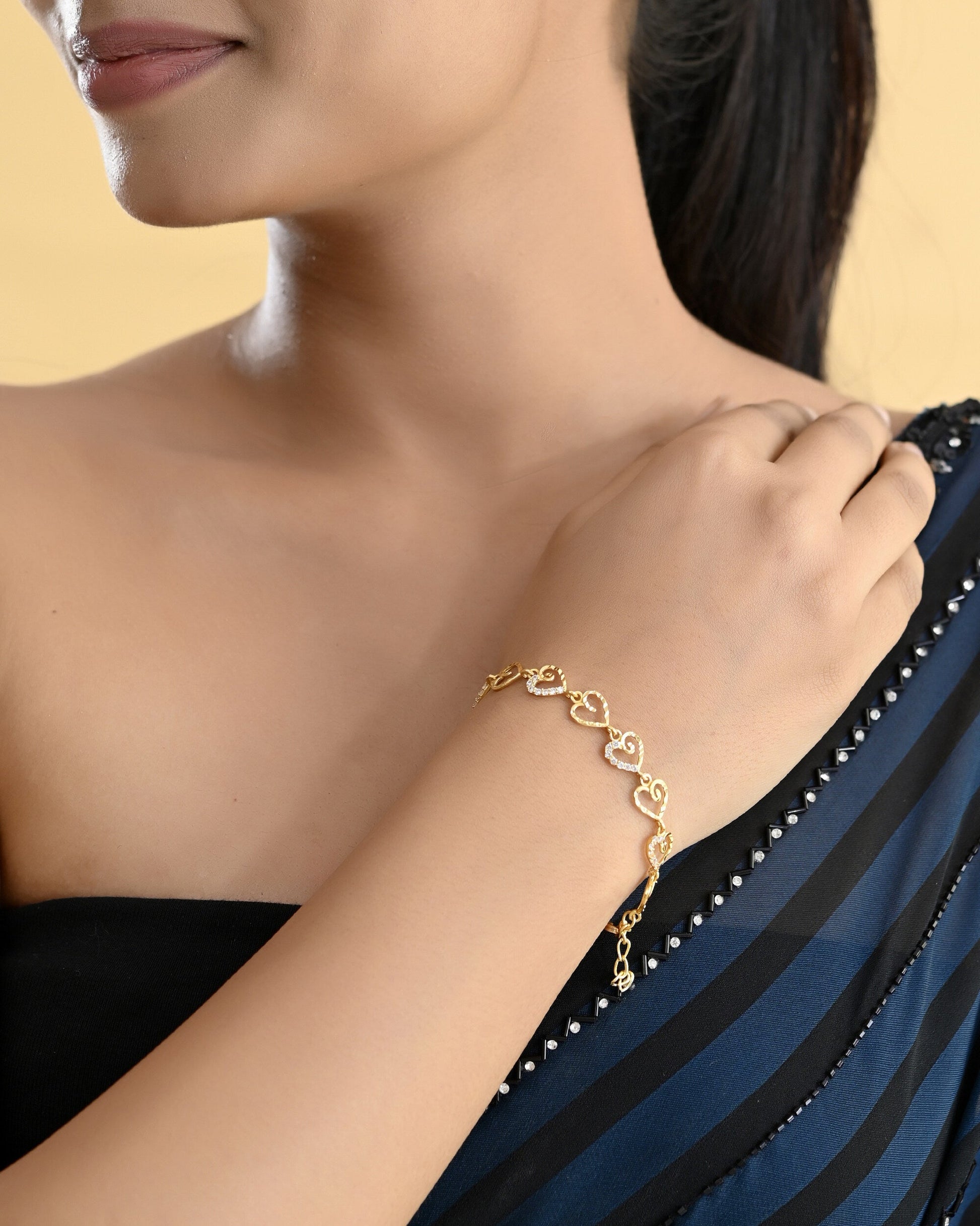 VOJ Gold-Polished Heart Shapped AD Stone Studded Women's Bracelet VOJ (Valley Of Jewellery)