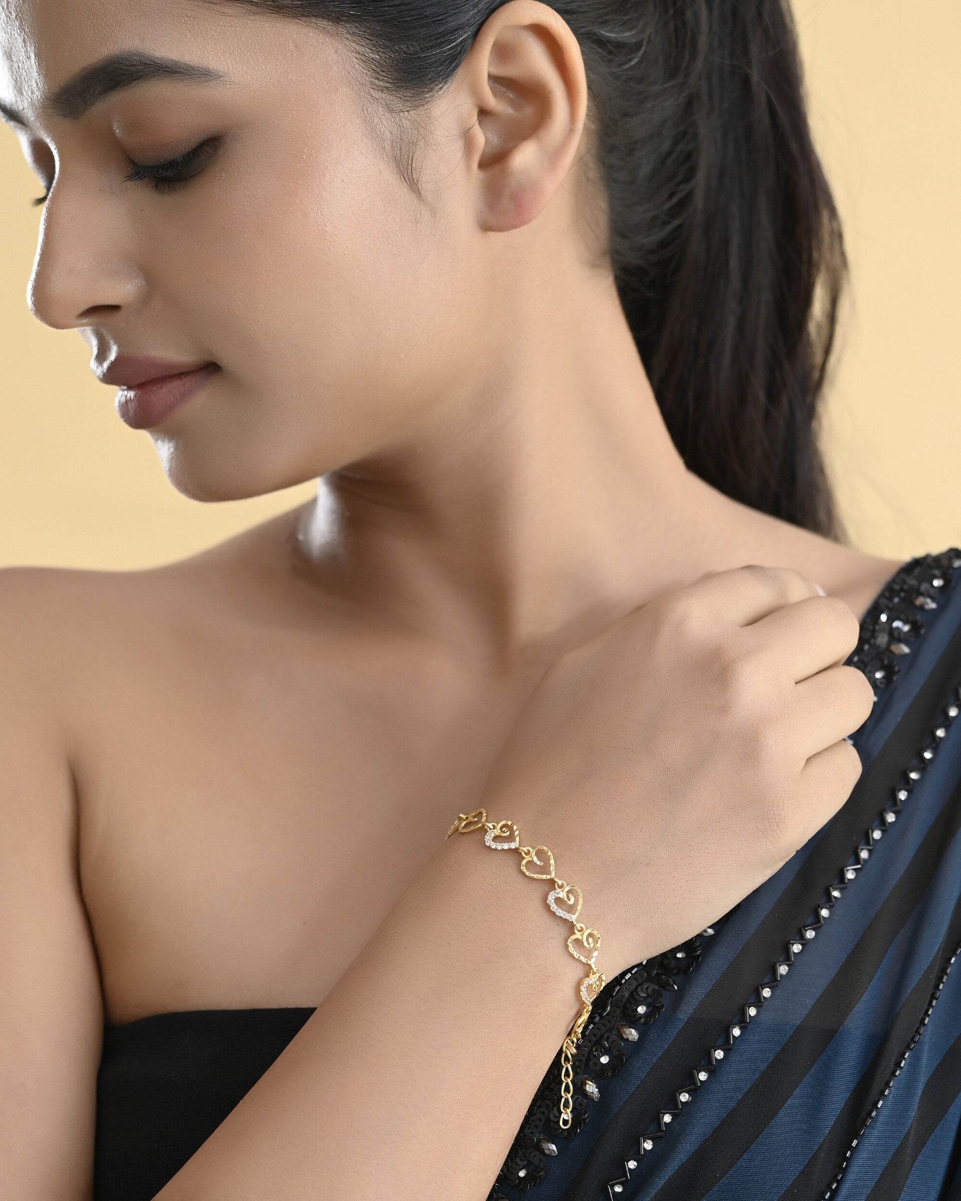 VOJ Gold-Polished Heart Shapped AD Stone Studded Women's Bracelet VOJ (Valley Of Jewellery)