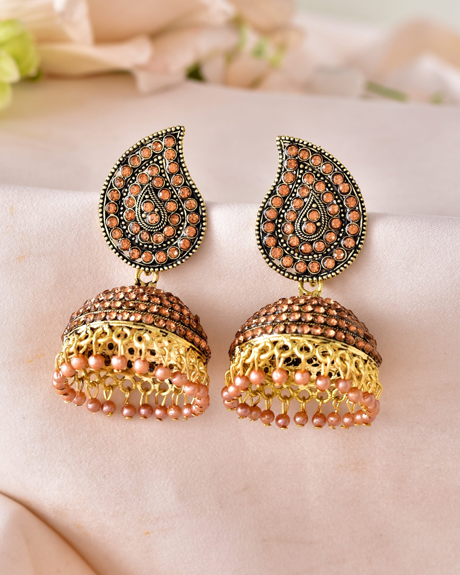 VOJ Gold Toned Stone Studded Done Shaped Jhumka Earrings VOJ (Valley Of Jewellery)