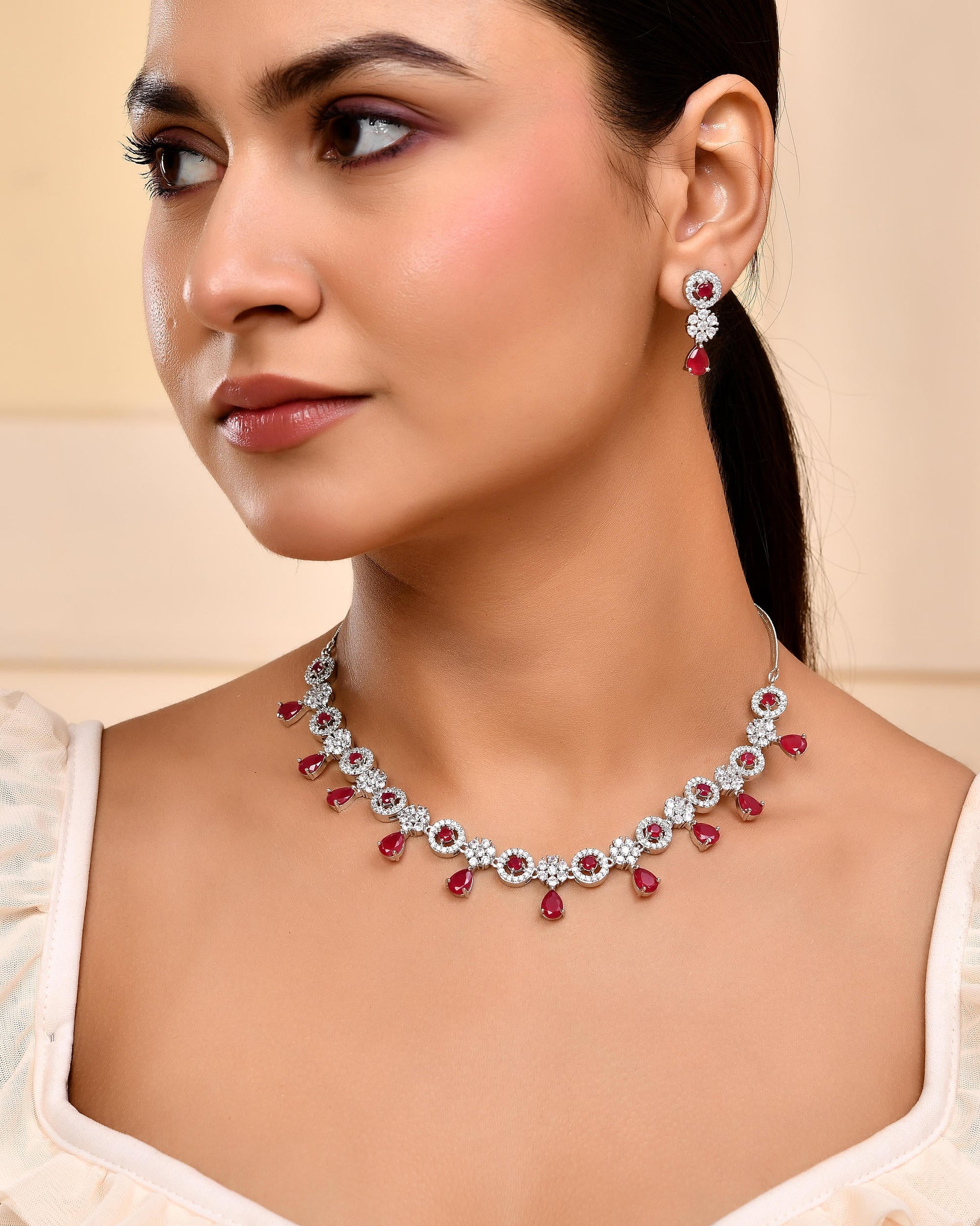 VOJ Silver Plated White And Marron AD Studded Circular Shape Jewellery Set VOJ (Valley Of Jewellery)