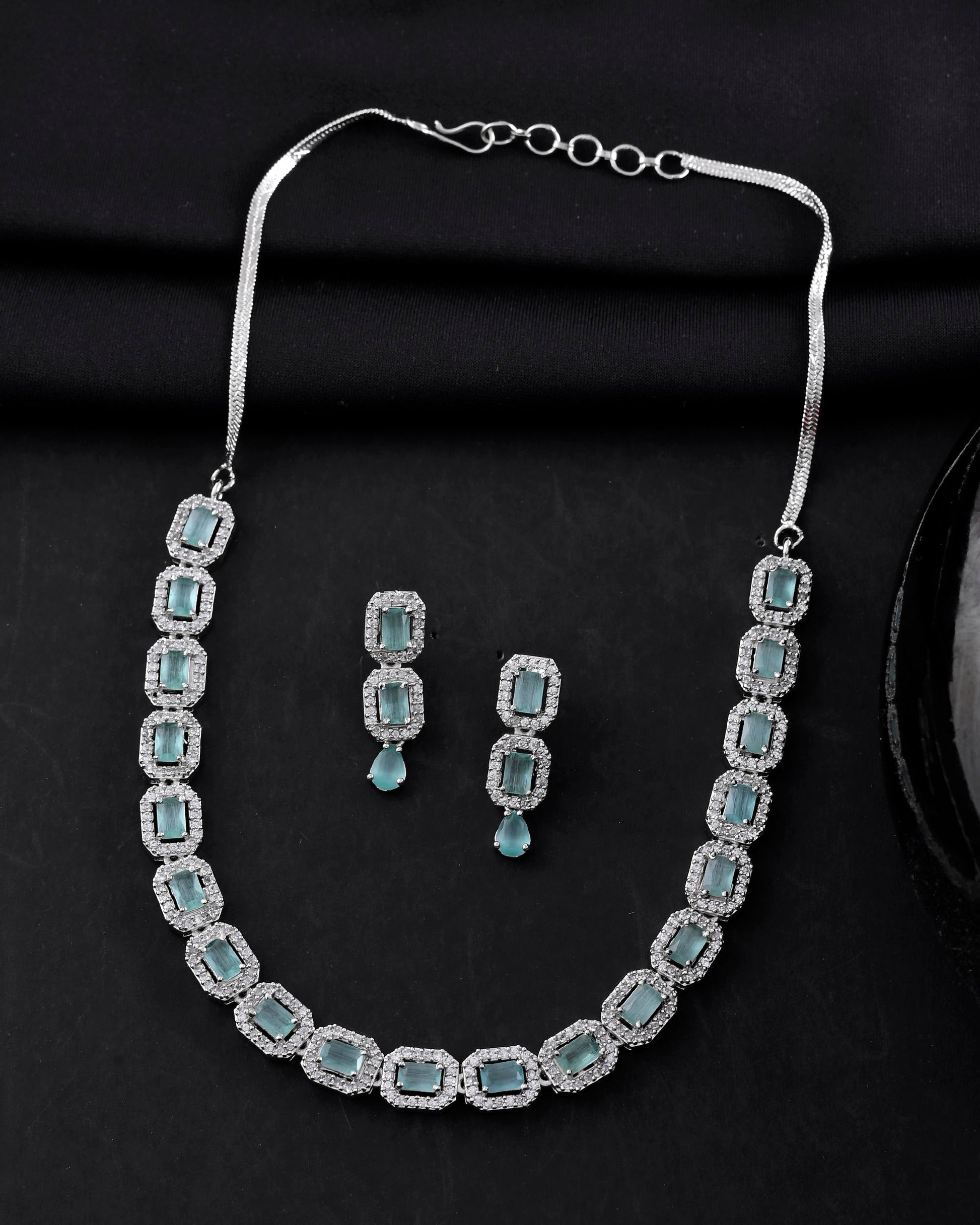 VOJ Silver Plated Sea Green Stone Studded Rectangular AD Jewellery Set