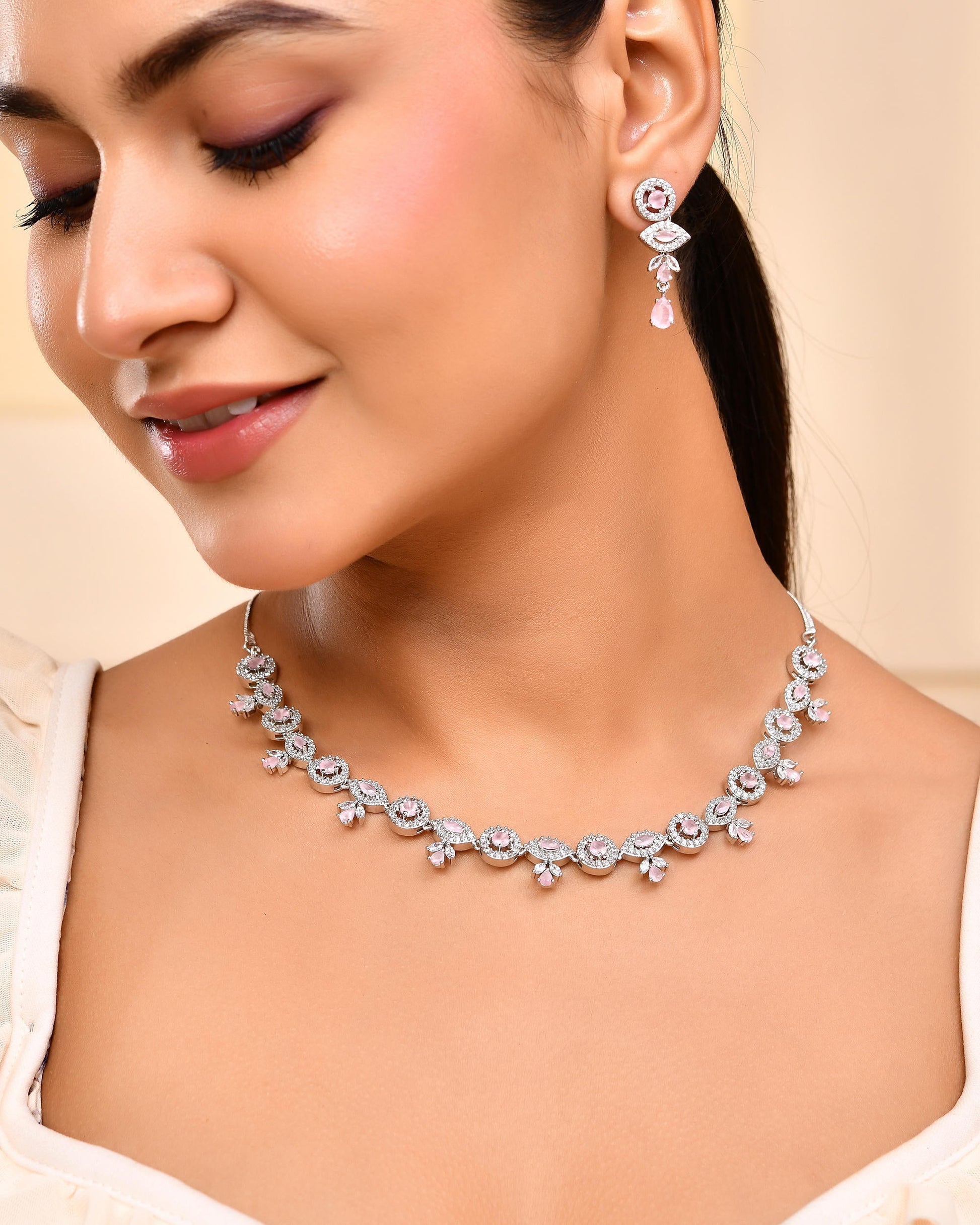 VOJ Silver Toned White And Baby Pink Stone Studded AD Jewellery Set VOJ (Valley Of Jewellery)