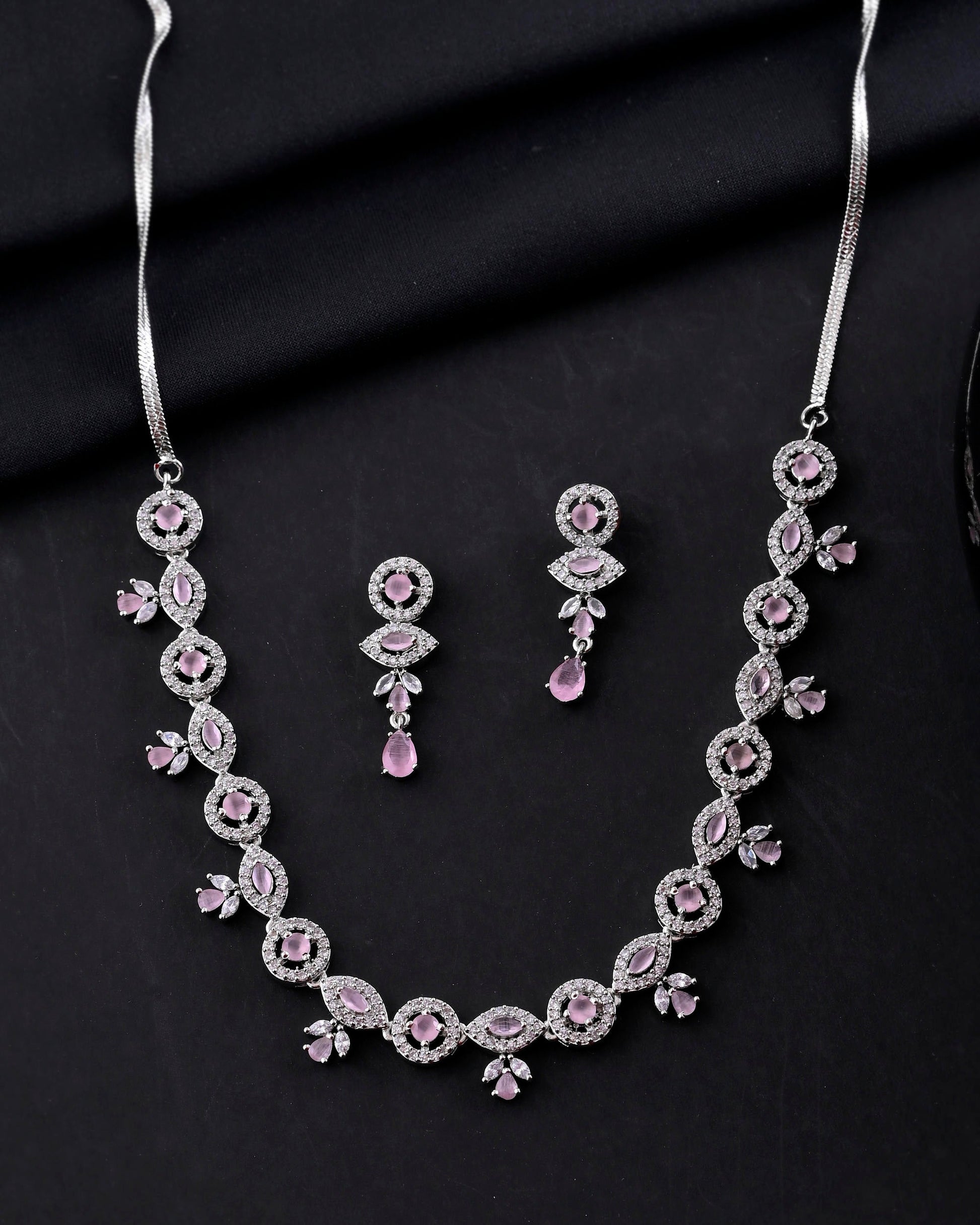 VOJ Silver Toned White And Baby Pink Stone Studded AD Jewellery Set VOJ (Valley Of Jewellery)