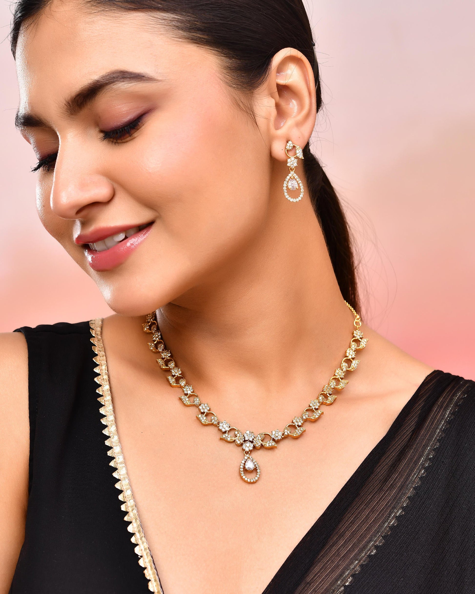 VOJ Gold-Polished Floral Shaped AD Studded Elgent Jewellery Set VOJ (Valley Of Jewellery)