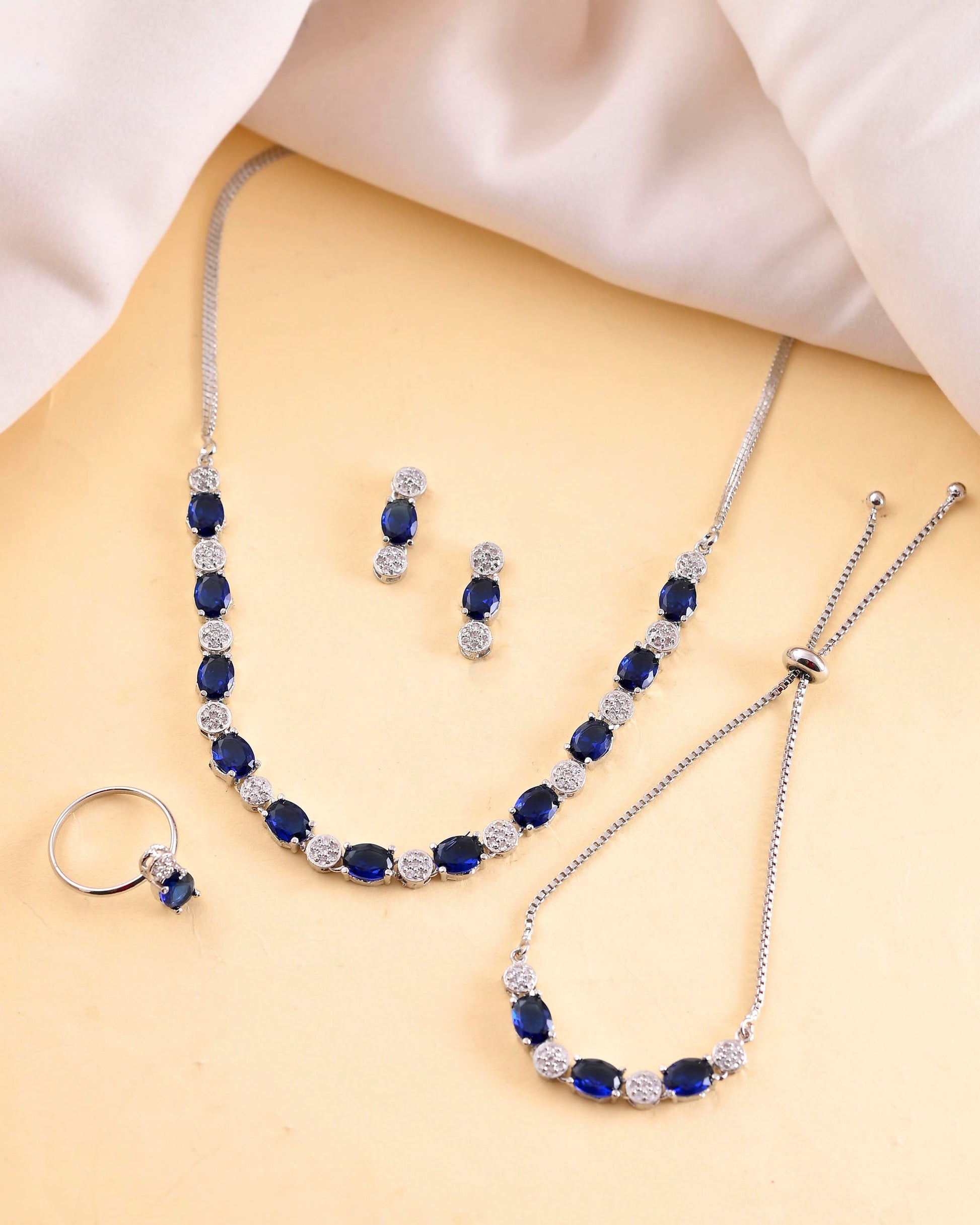 VOJ Silver Plated Blue Stone Studded Necklace Set With Ring And bracelet VOJ (Valley Of Jewellery)