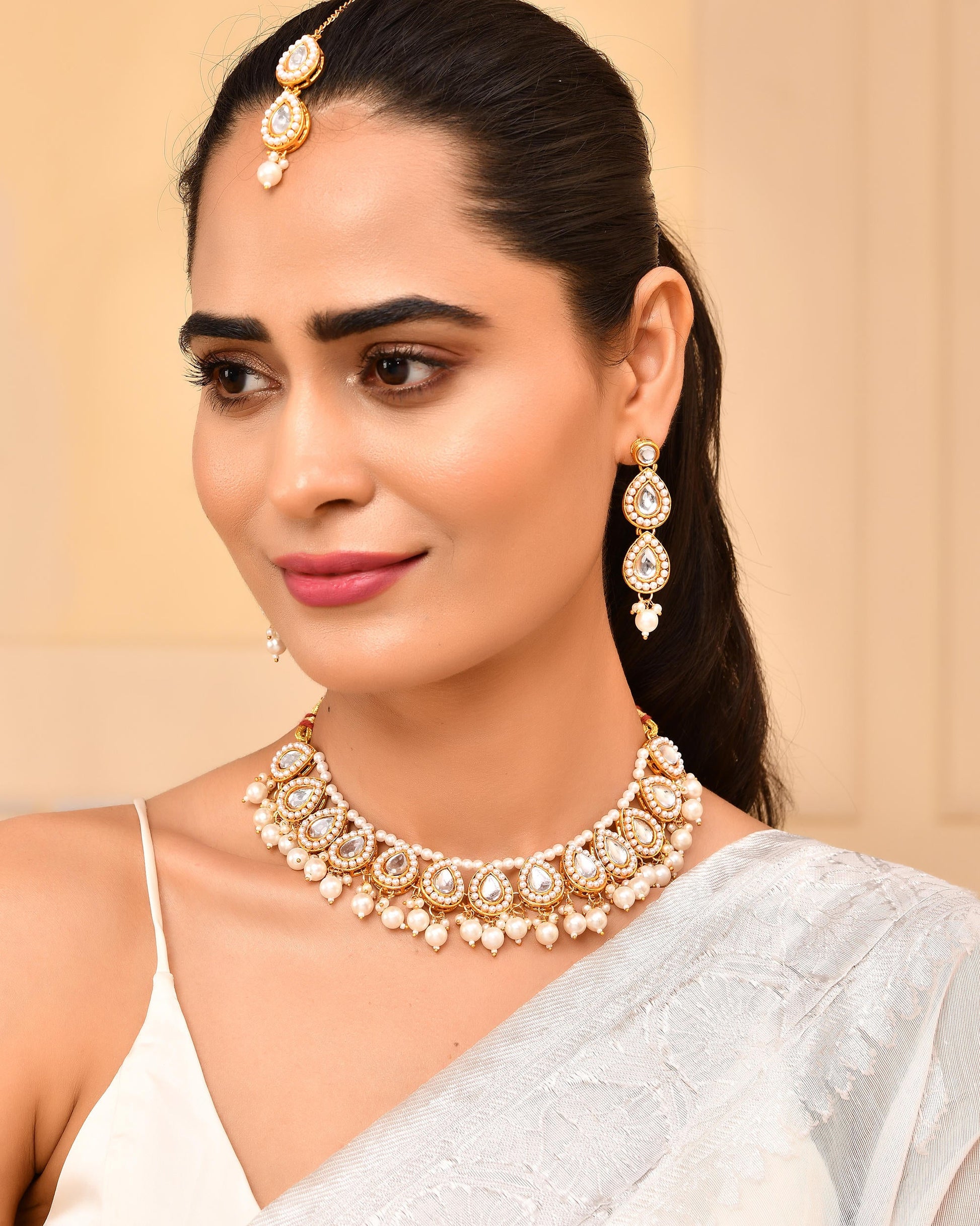 VOJ Gold-Polished Kundan Stones Studded Jewellery Set With Maang Tikka VOJ (Valley Of Jewellery)