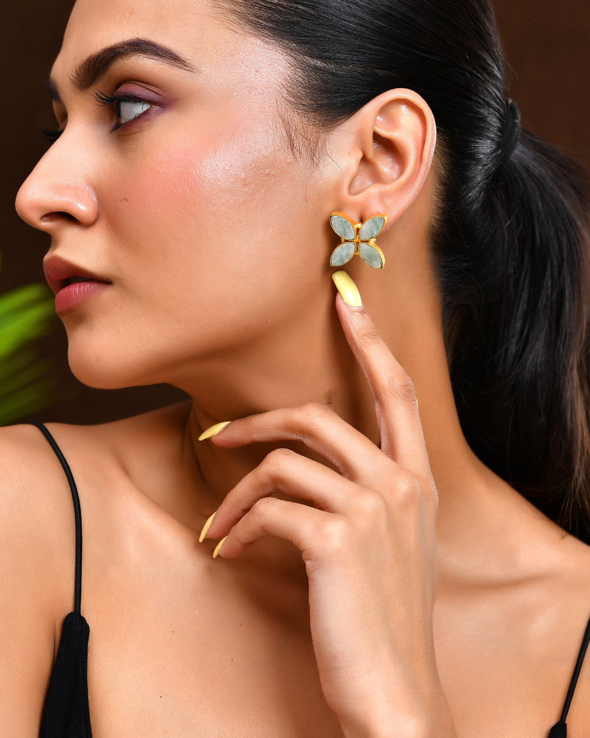 VOJ Gold Polished Teal Stone Studded Floral Stud Earrings - Swadesiicart