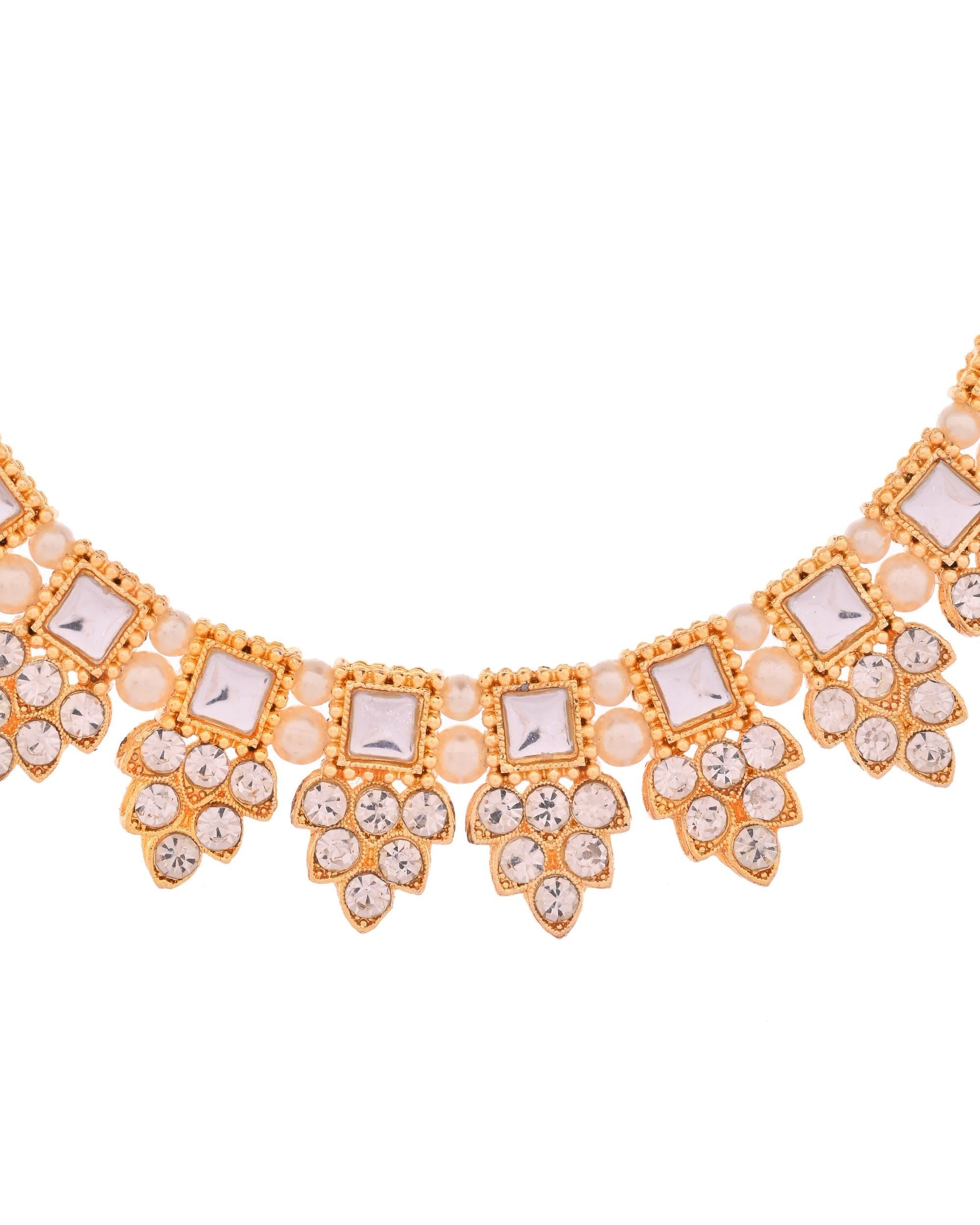 VOJ Gold Polished Stone Studded Necklace Set With Maang Tikka VOJ (Valley Of Jewellery)