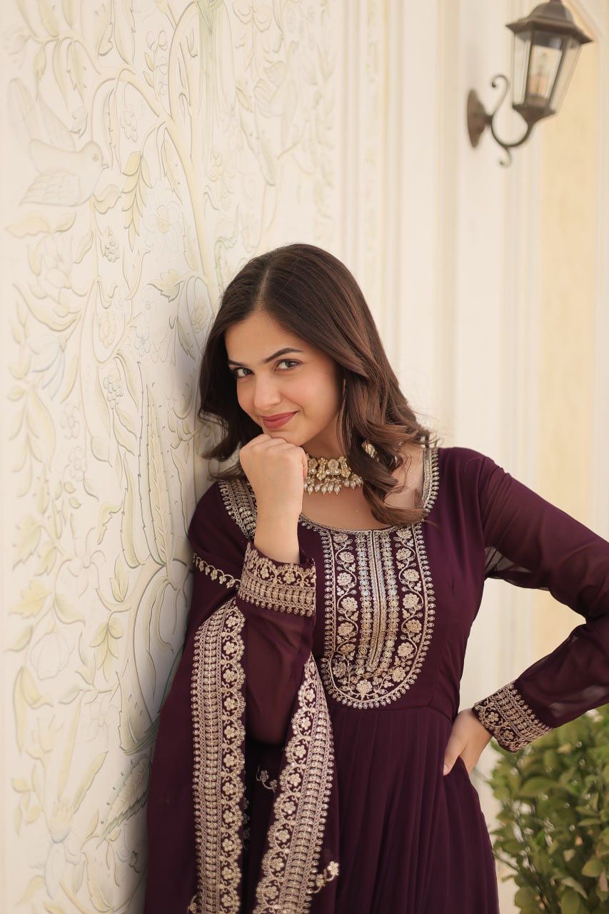 Evanik Wine Faux Blooming Gown with Dupatta With Attractive Embroidered Sequins work
