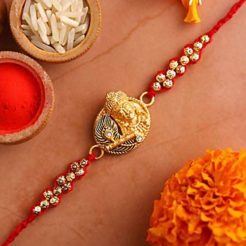 Krishna With Flute Rakhi and Fruit N Nut Chocolates