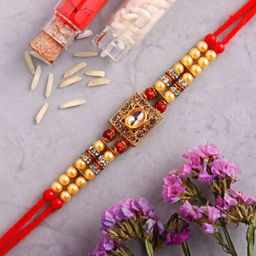 Special Kundan Rakhi and Kaju Rolls Box Combo