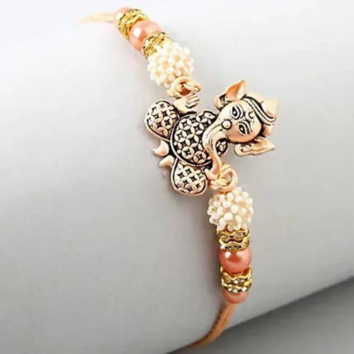 Holy Ganesha Rakhi & 24 Pcs Ferrero Rocher