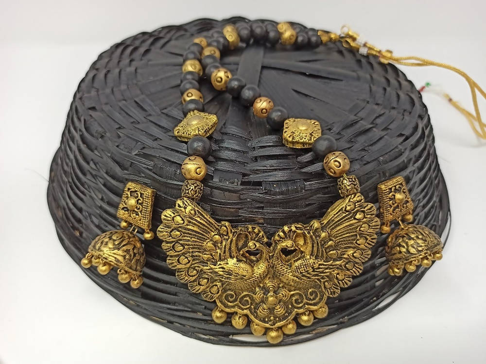 Terracotta Long Necklace Set With Peacock Pendant With Temple Jhumkas-Black And Gold