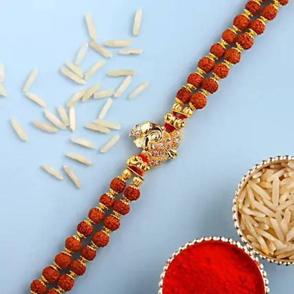 Ganesha Minimal Style Rakhi And Kaju Rolls Box