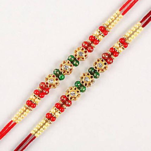 Set of 2 Charming Beads Rakhi and Dairy Milk Fruit N Nut Chocolates Combo