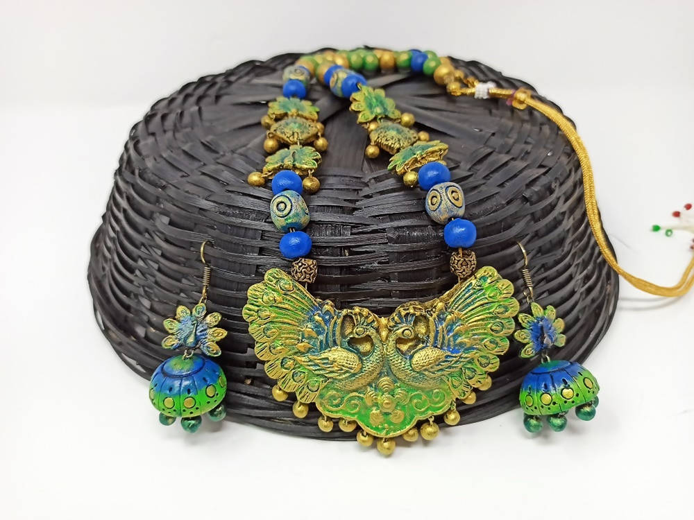 Terracotta Long Haram Set-Beautiful Dazzling Peacock Pendent With Ear Hanging Jhumkas