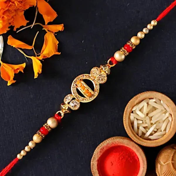 Elegant Meenakari Rakhi And Cashew Jar