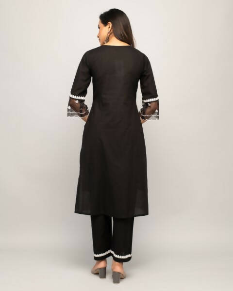 FIORRA Women's Black Cotton Straight Kurta Palazzo Set 