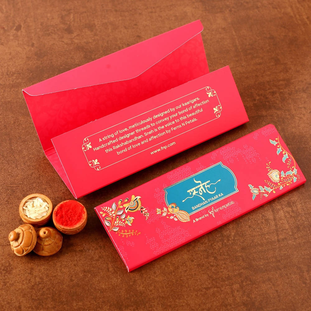 Cute Ganesha Rakhi & Silk Chocolates