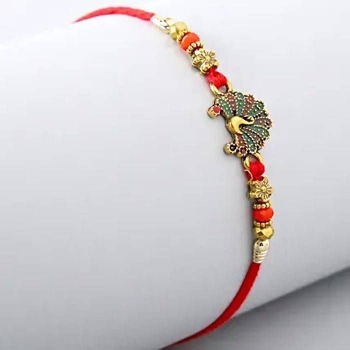 Beautiful Peacock Ethnic Rakhi & Cadbury Temptations