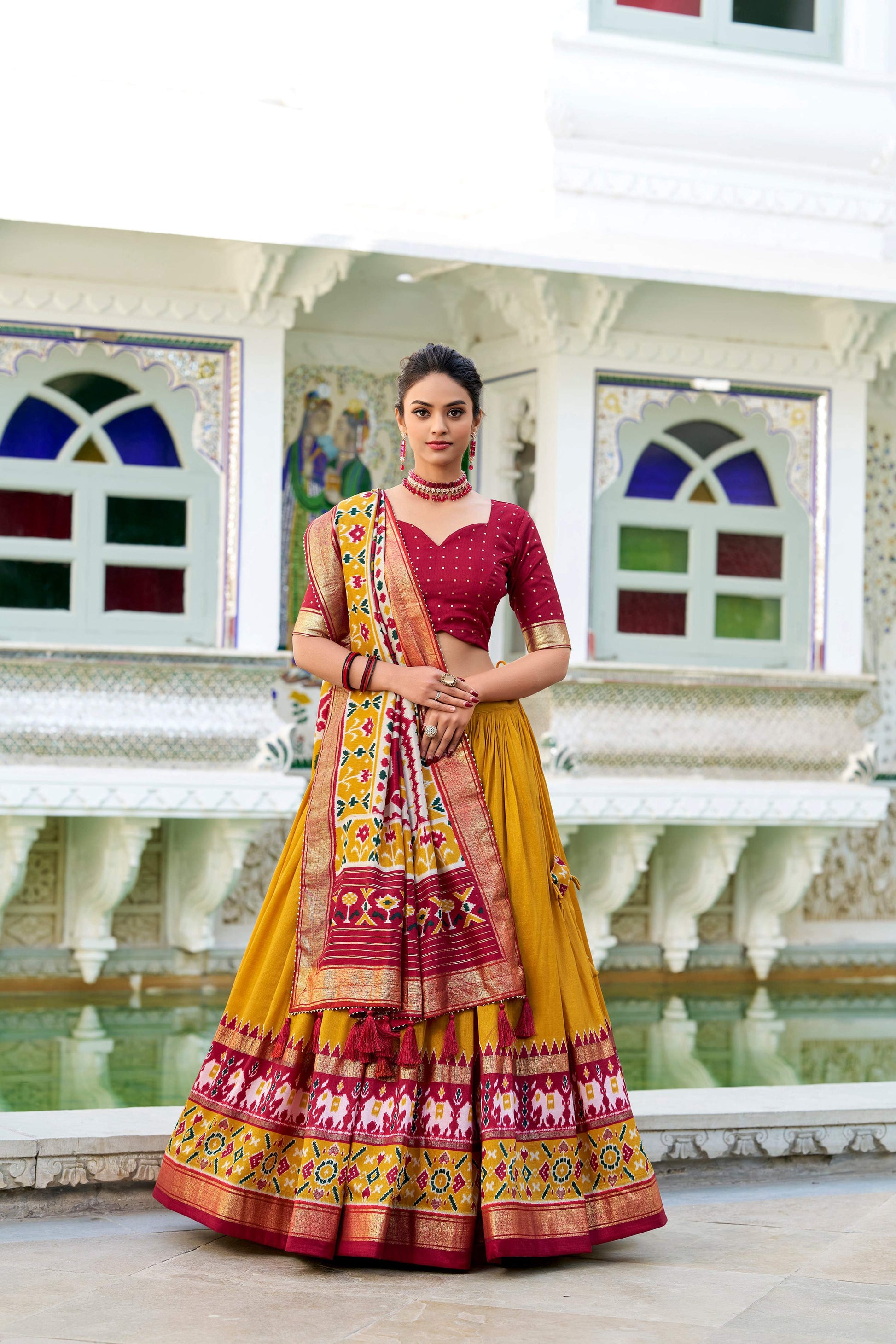 Evanik Mustard Traditional Style Tussar Silk Patola Print With Foil Work Unstitched Lehenga Choli