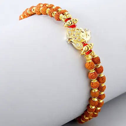 Ganesha Minimal Style Rakhi And Kaju Rolls Box