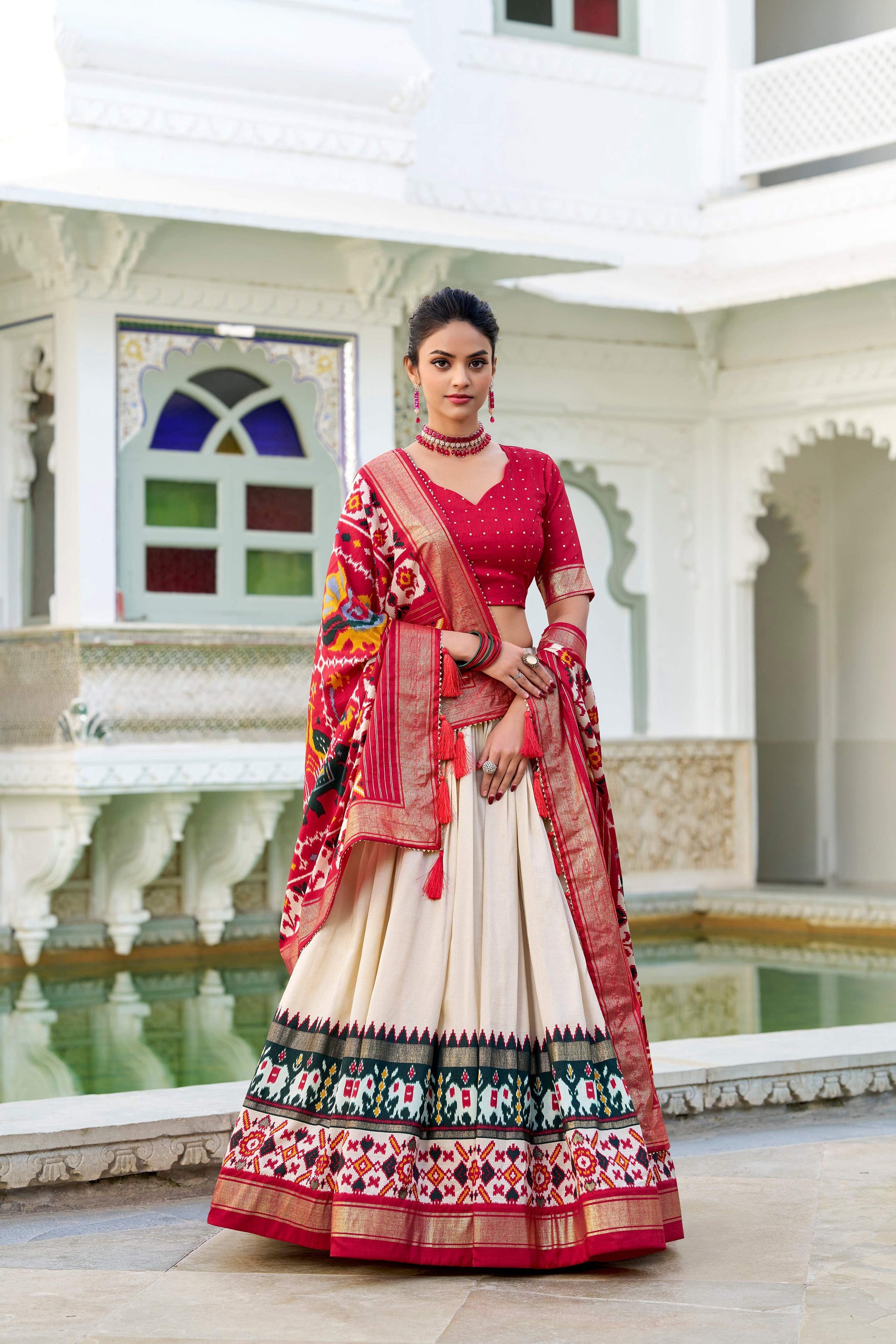Evanik Off White Traditional Style Tussar Silk Patola Print With Foil Work Unstitched Lehenga Choli