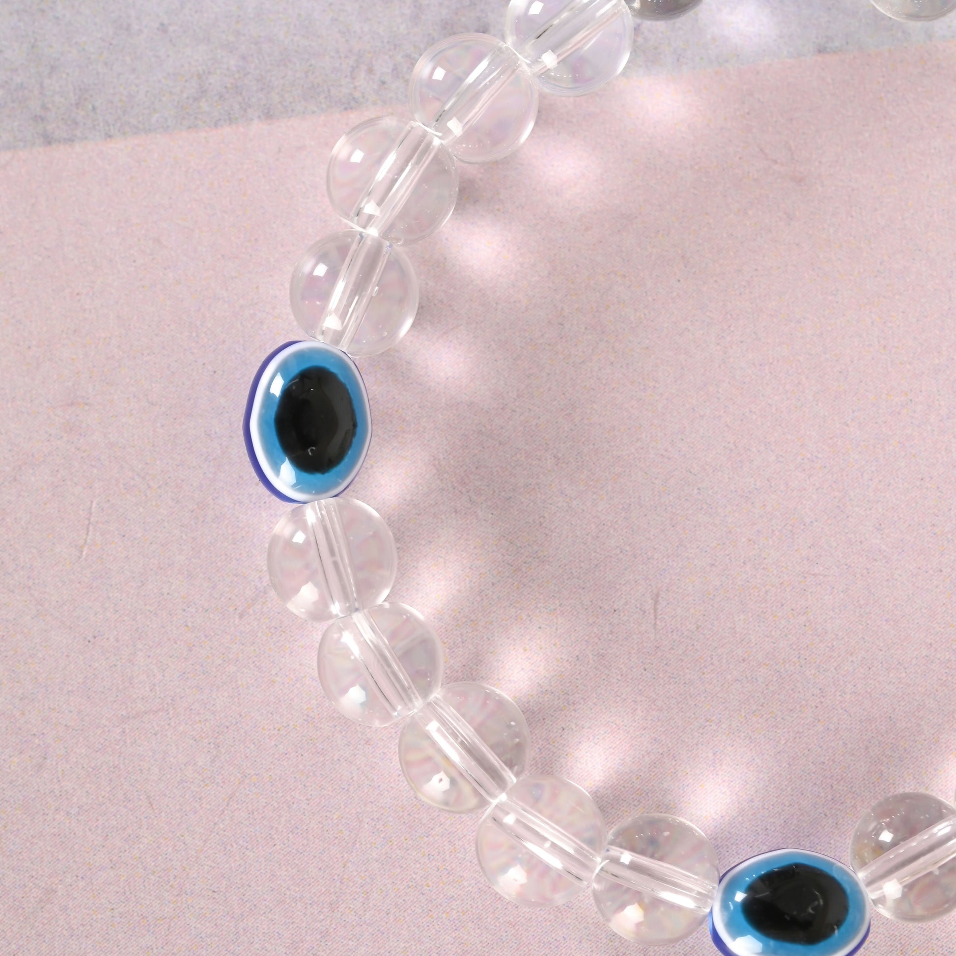 NVR Men & Women Evil Eyetransparent Beaded Elasticated Bracelet | Grab2Buy