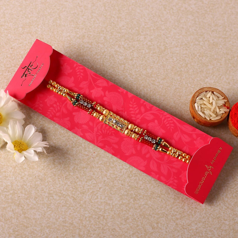 Dainty Kundan Rakhi And Kaju Rolls Box